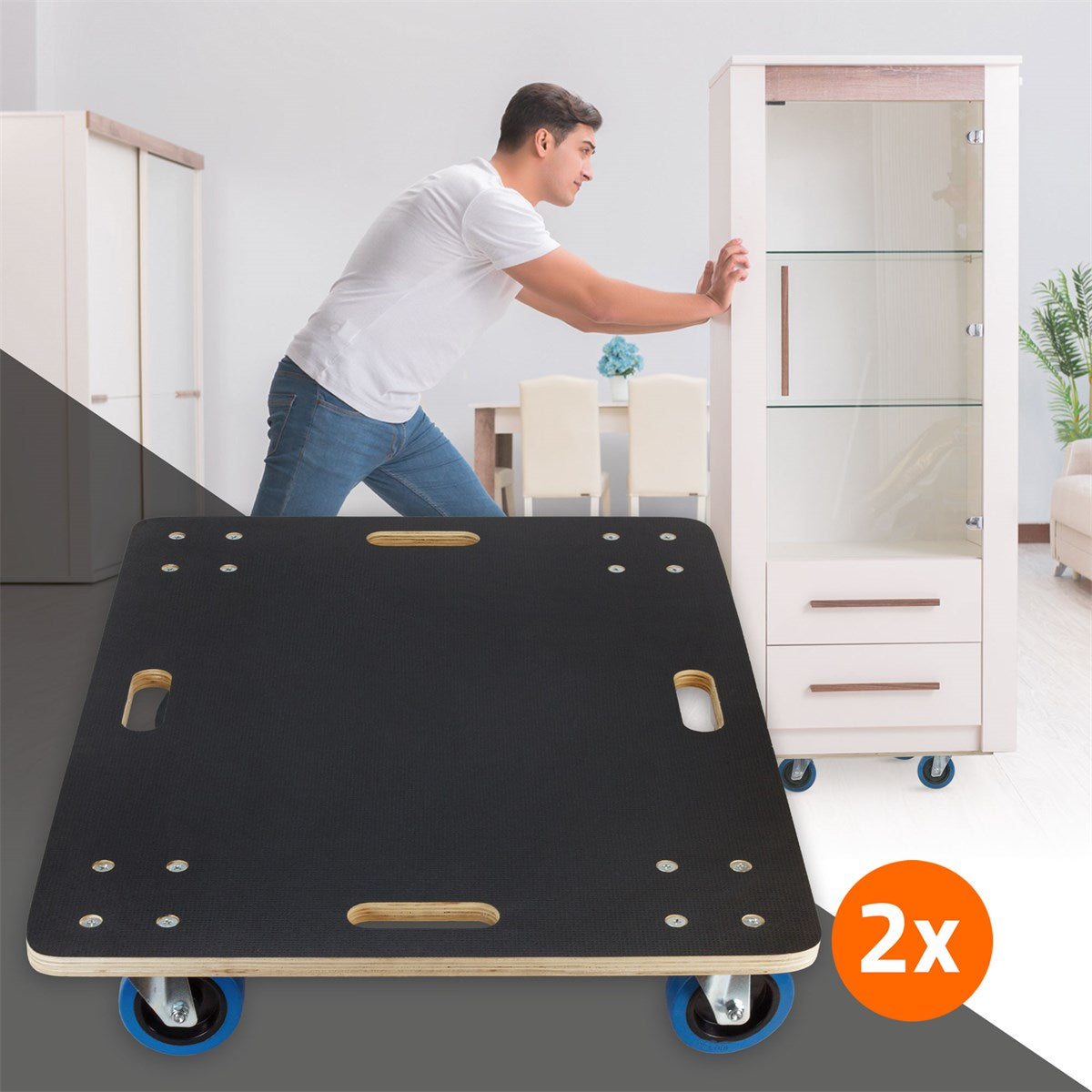 A man pushes a cabinet on a black dolly with blue wheels.