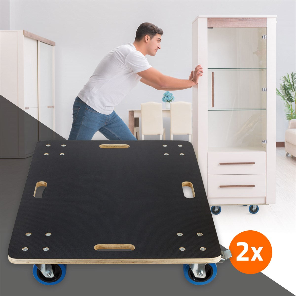 A man pushes a furniture dolly with a cabinet.