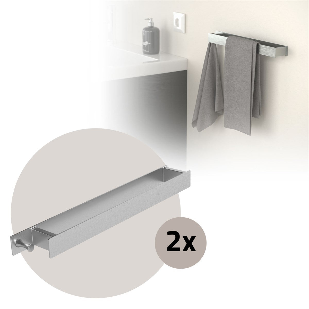Two metal towel holders with towels in the bathroom.