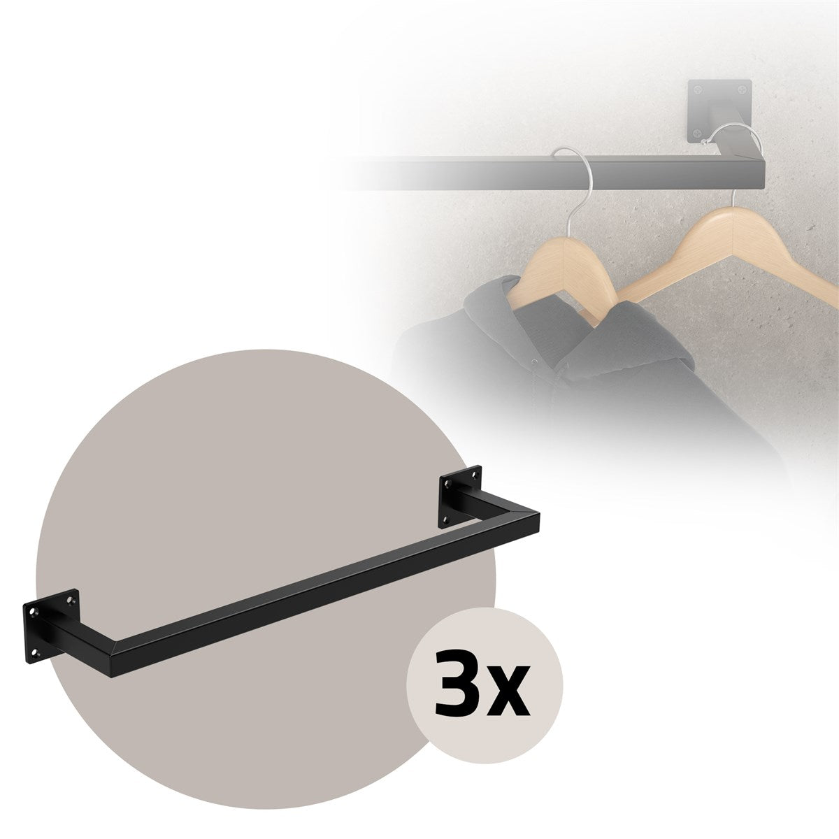 Black clothes hanger with three hooks on a wall.