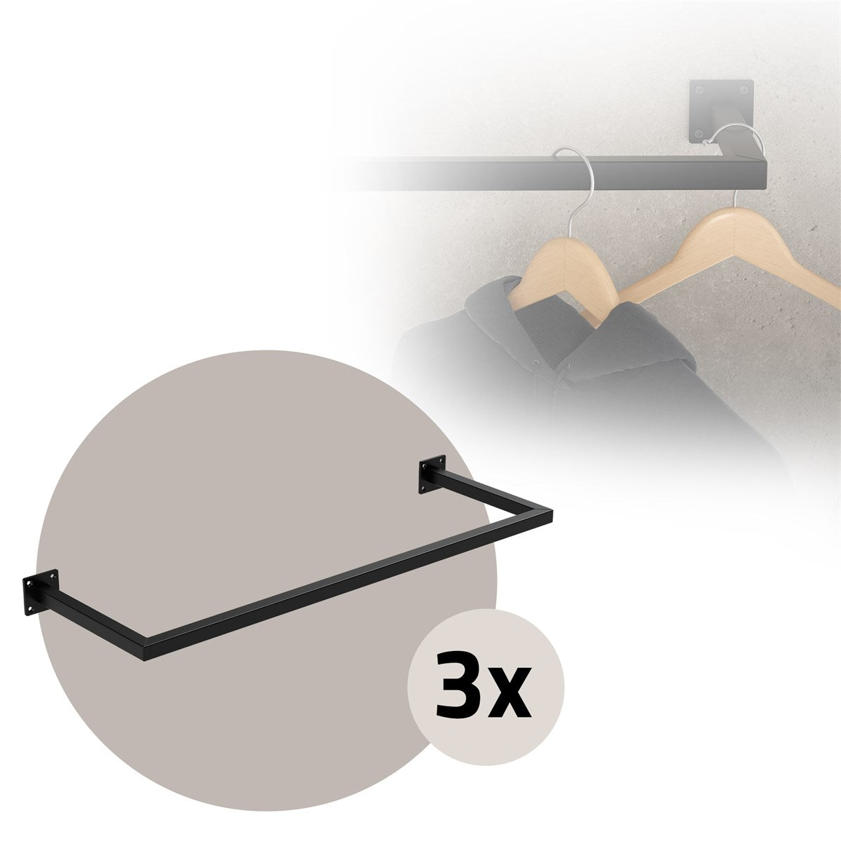 Black clothes hanger with three hooks on a wall.