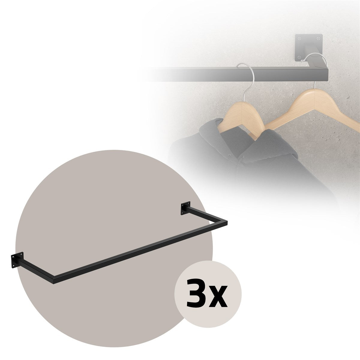 Black clothes hanger with three hooks on a wall.