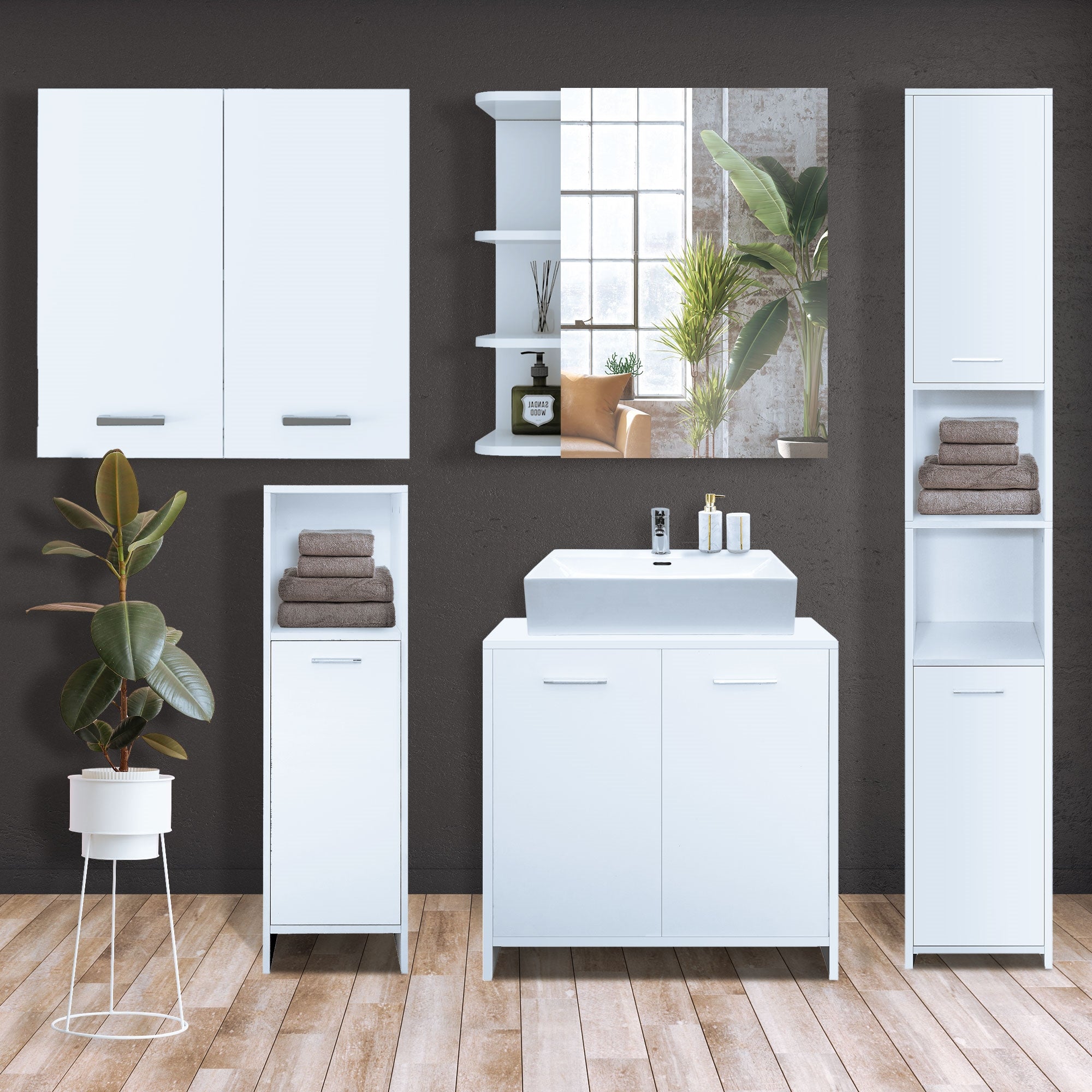 Mobili da bagno con piante, asciugamani e un lavabo in una stanza moderna.