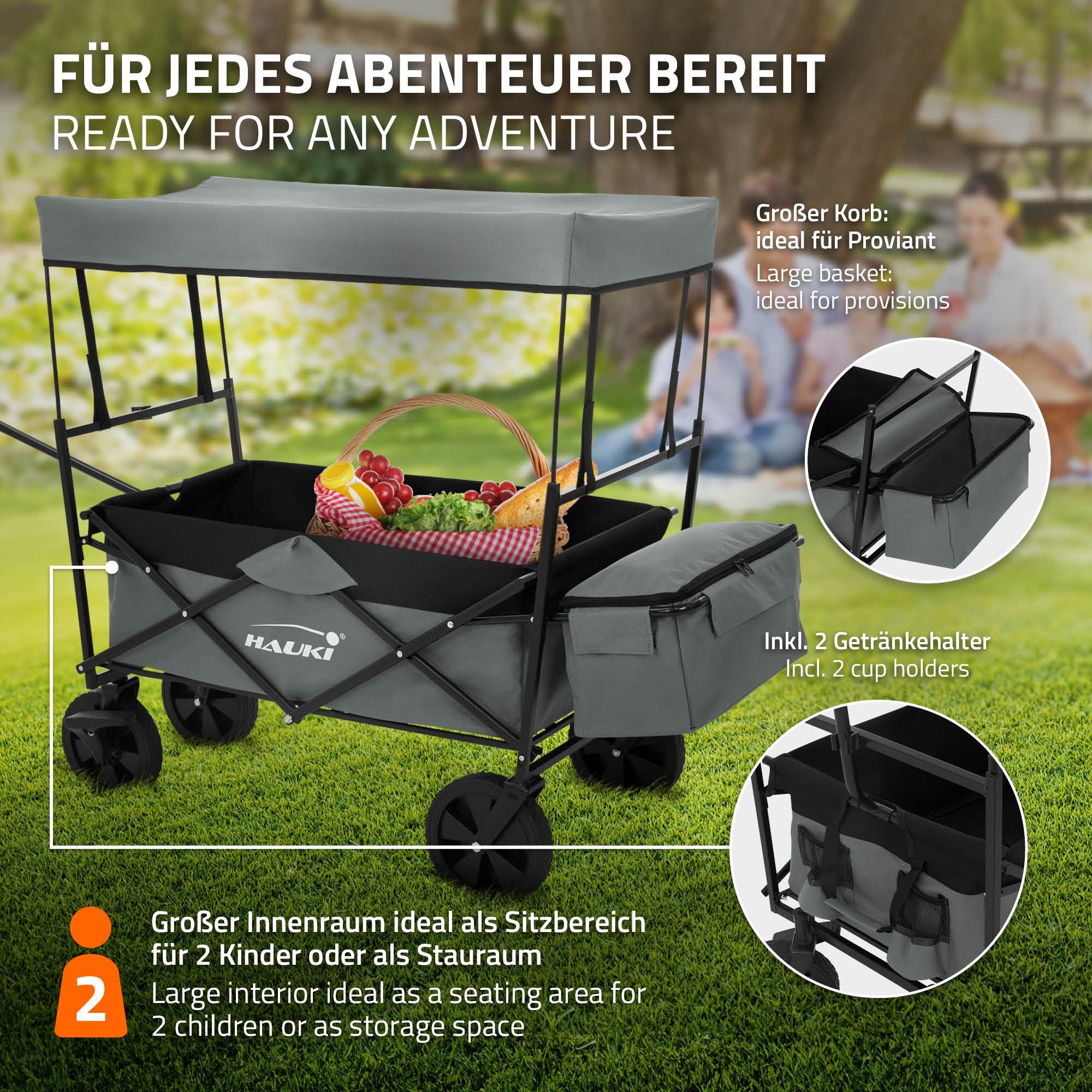 Wagen mit großem Korb, zwei Getränkehaltern und Stauraum, auf Wiese.
