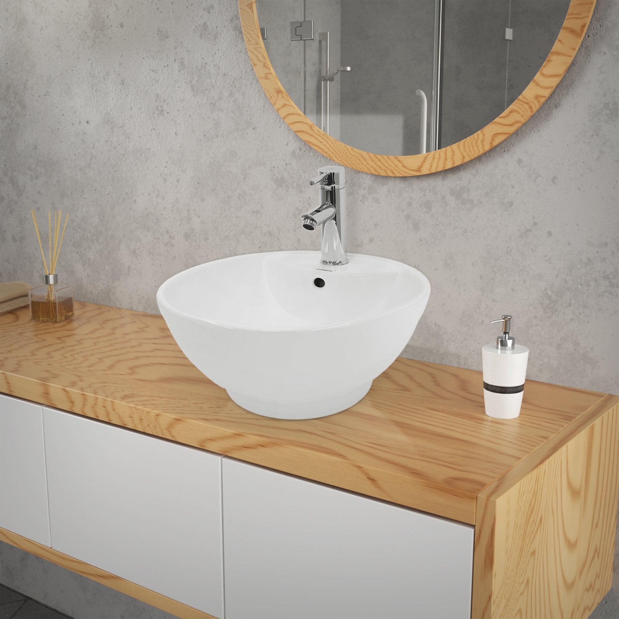 Close-up of a round sink on a wooden washstand.