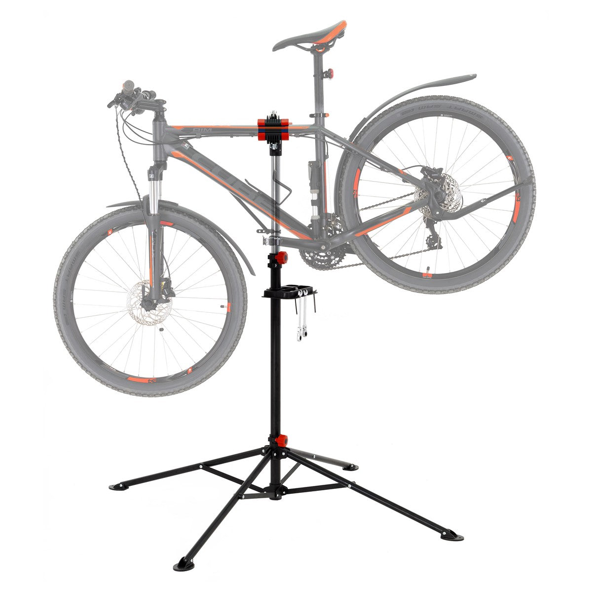 A bicycle is held in the air on a stand.