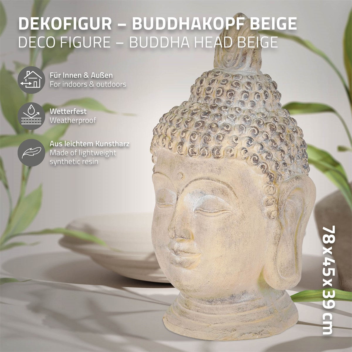 Ein Buddha-Kopf aus Kunstharz, umgeben von Pflanzen, mit Maßangaben.