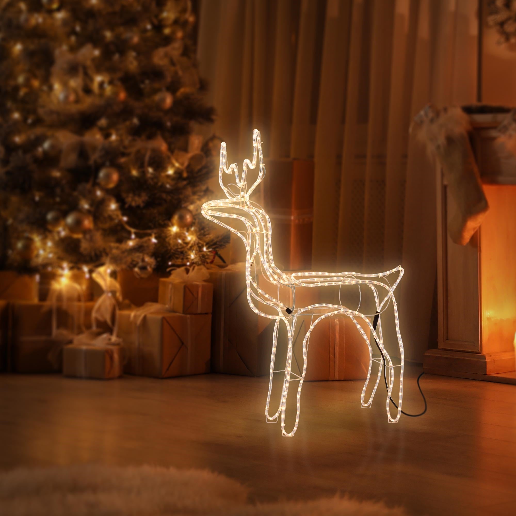 Glowing reindeer made of transparent material, standing in the room.
