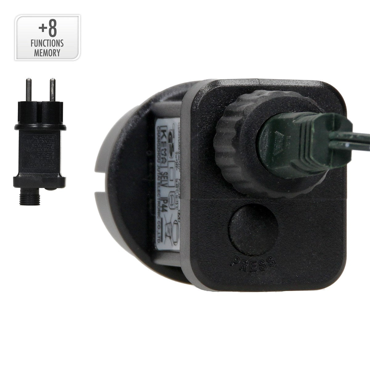 Ein schwarzes Gerät mit einem grünen Kabel und einem Stecker, daneben ein kleiner Stecker.
