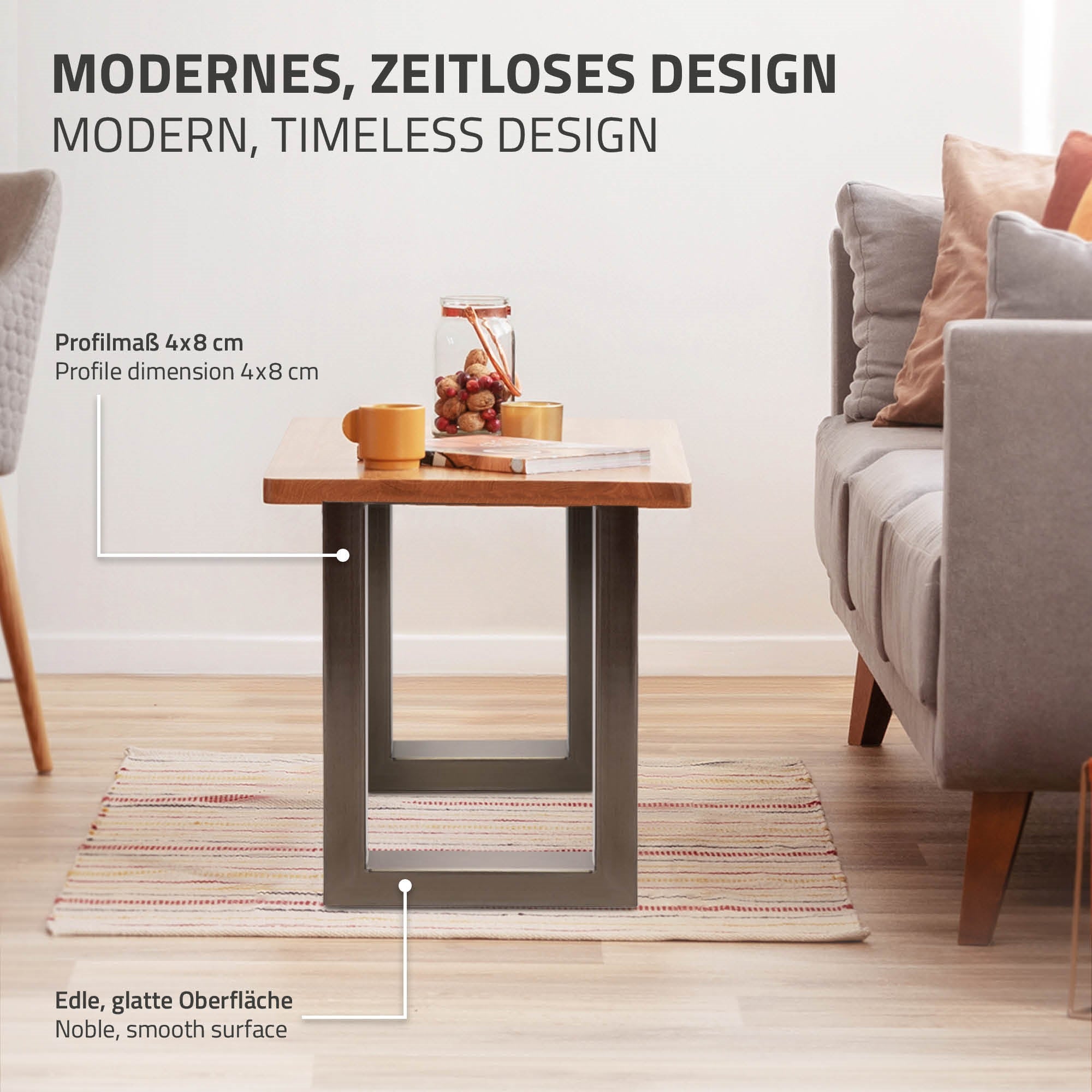 Holztisch mit Metallgestell, auf einem Teppich, mit Obstschale und Tasse.