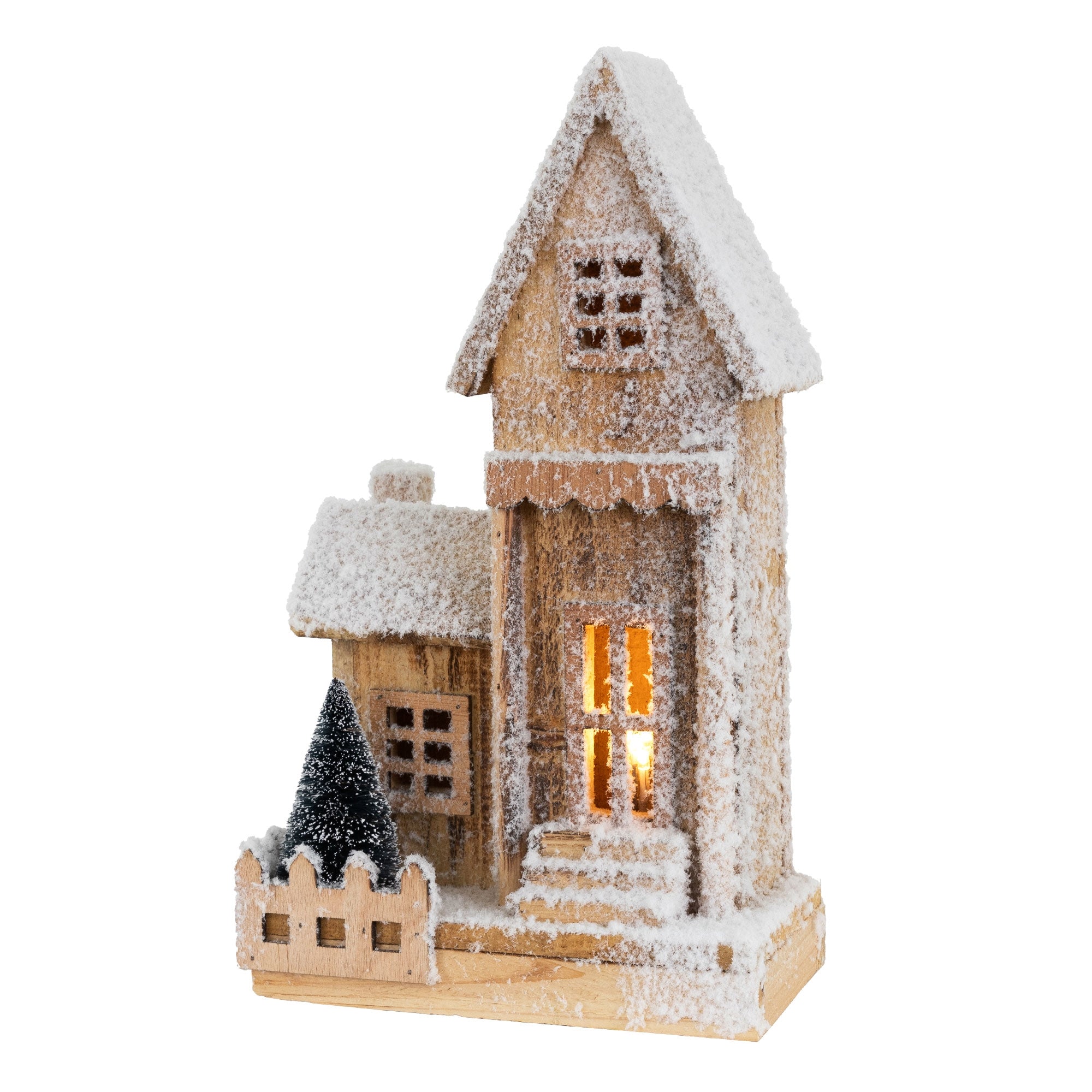 Holzhaus mit Schnee, beleuchtet, und kleiner Weihnachtsbaum.