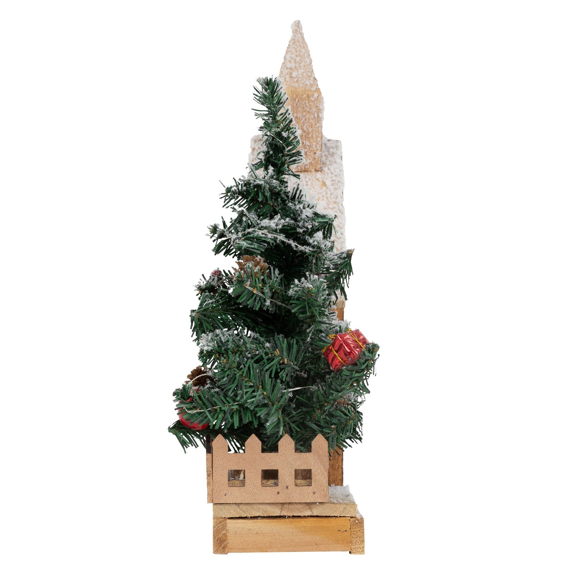 Seitenansicht eines Holzhauses mit einem Weihnachtsbaum.