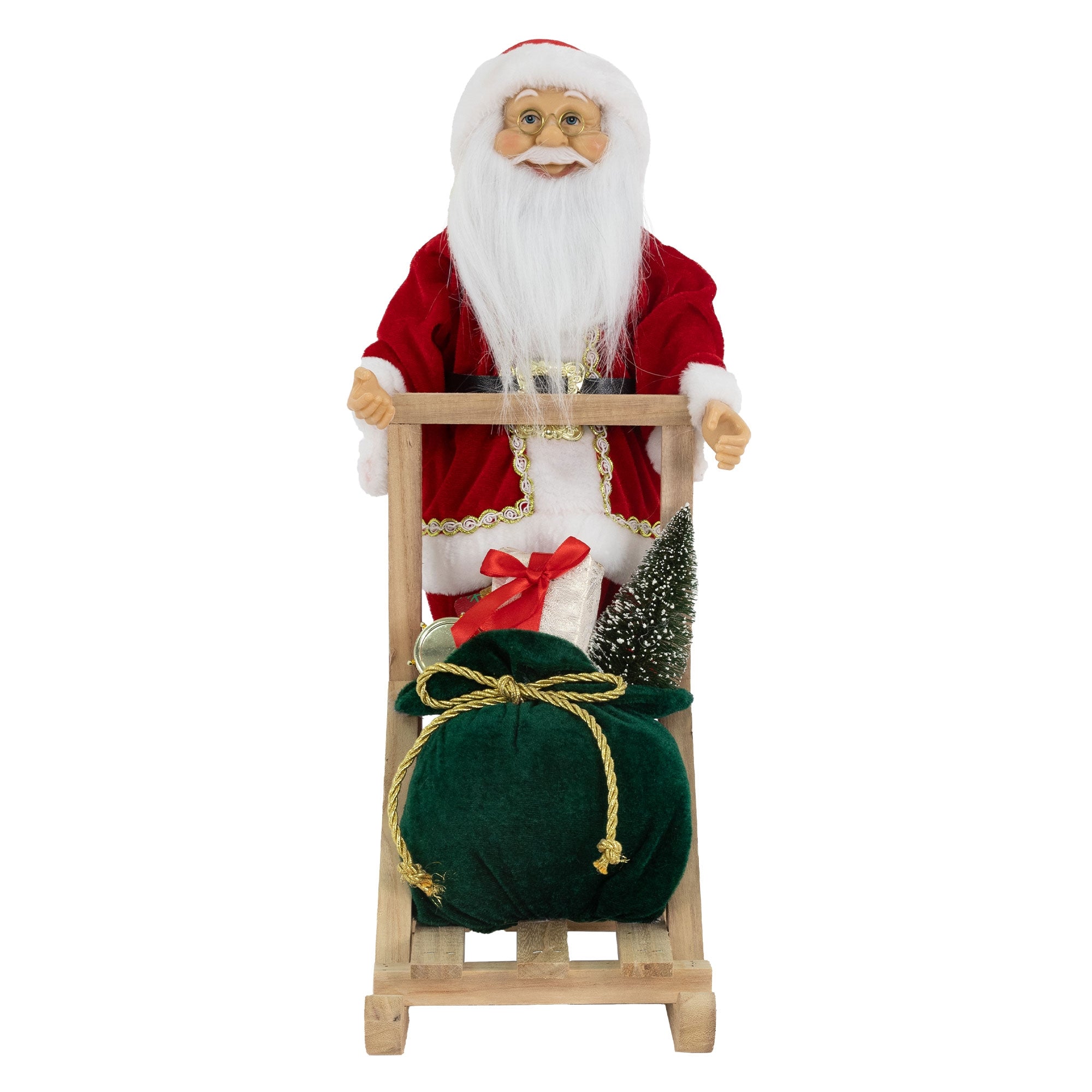 Weihnachtsmannfigur mit Sack und Tanne auf einer Holzschlitten.