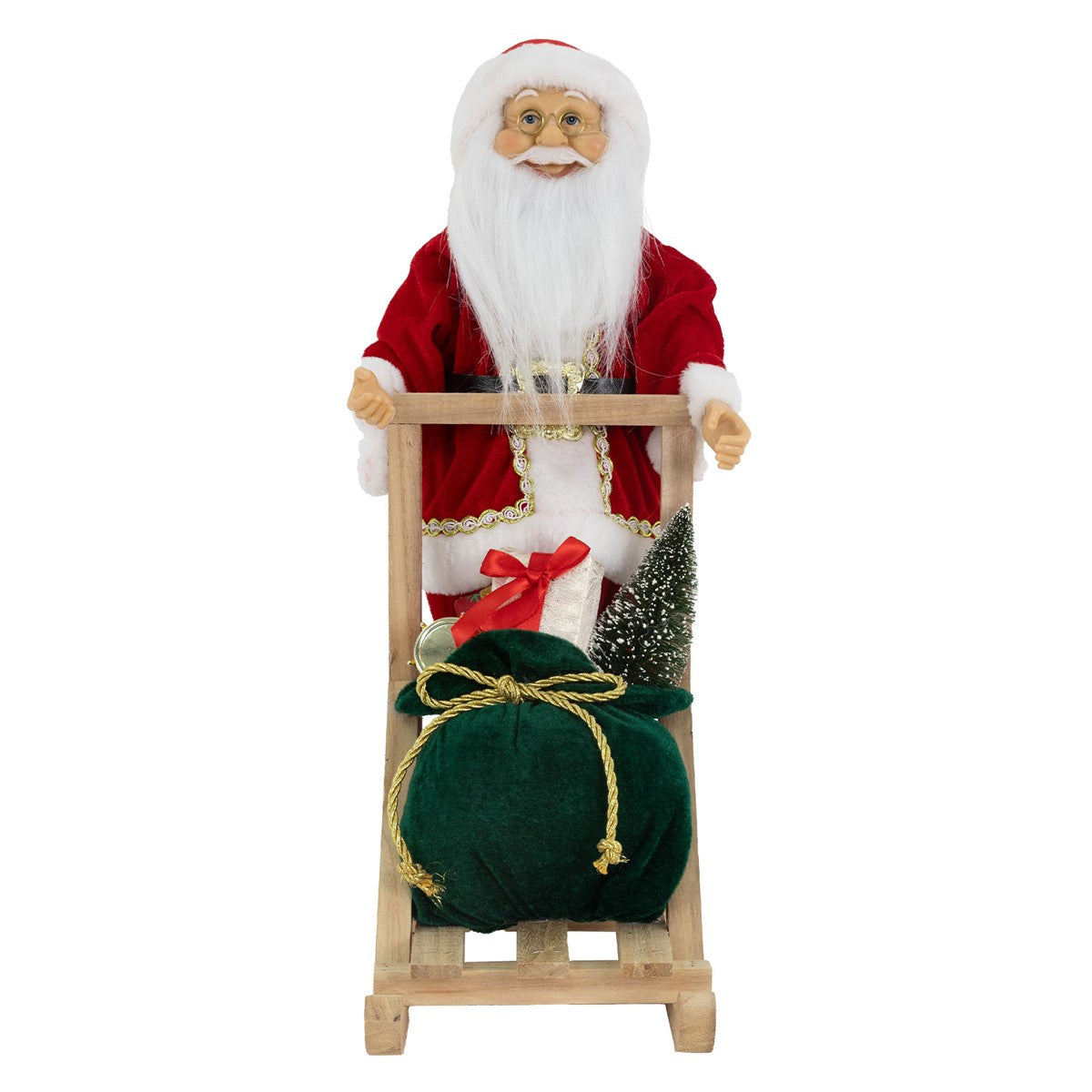 Julemandsfigur med sæk og grantræ på en træslæde.