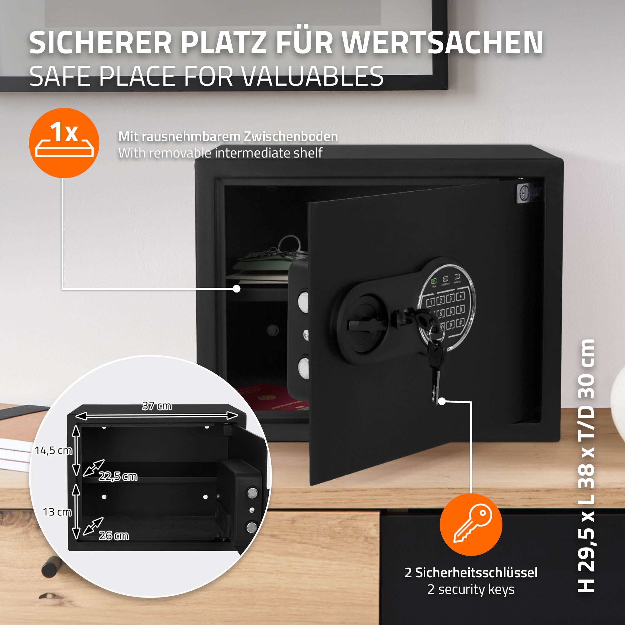 Offener schwarzer Safe mit Schlüssel und Maßangaben.