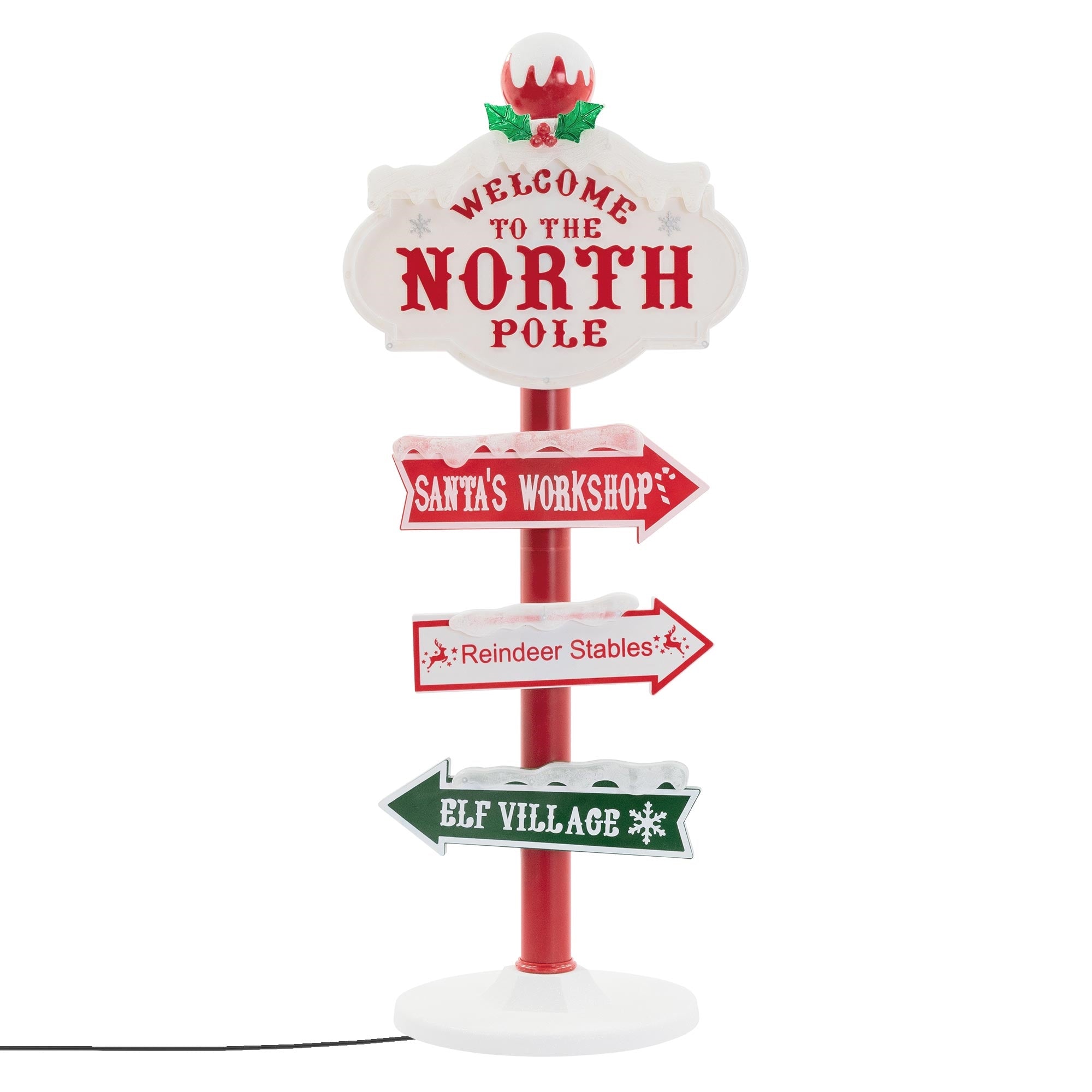 Schild mit Richtungspfeilen zu Santa's Werkstatt, Rentierställen und Elfen-Dorf.