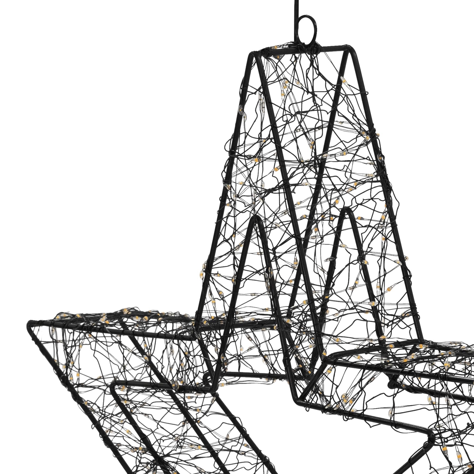 Étoile en fil noir avec des lumières, suspendue.