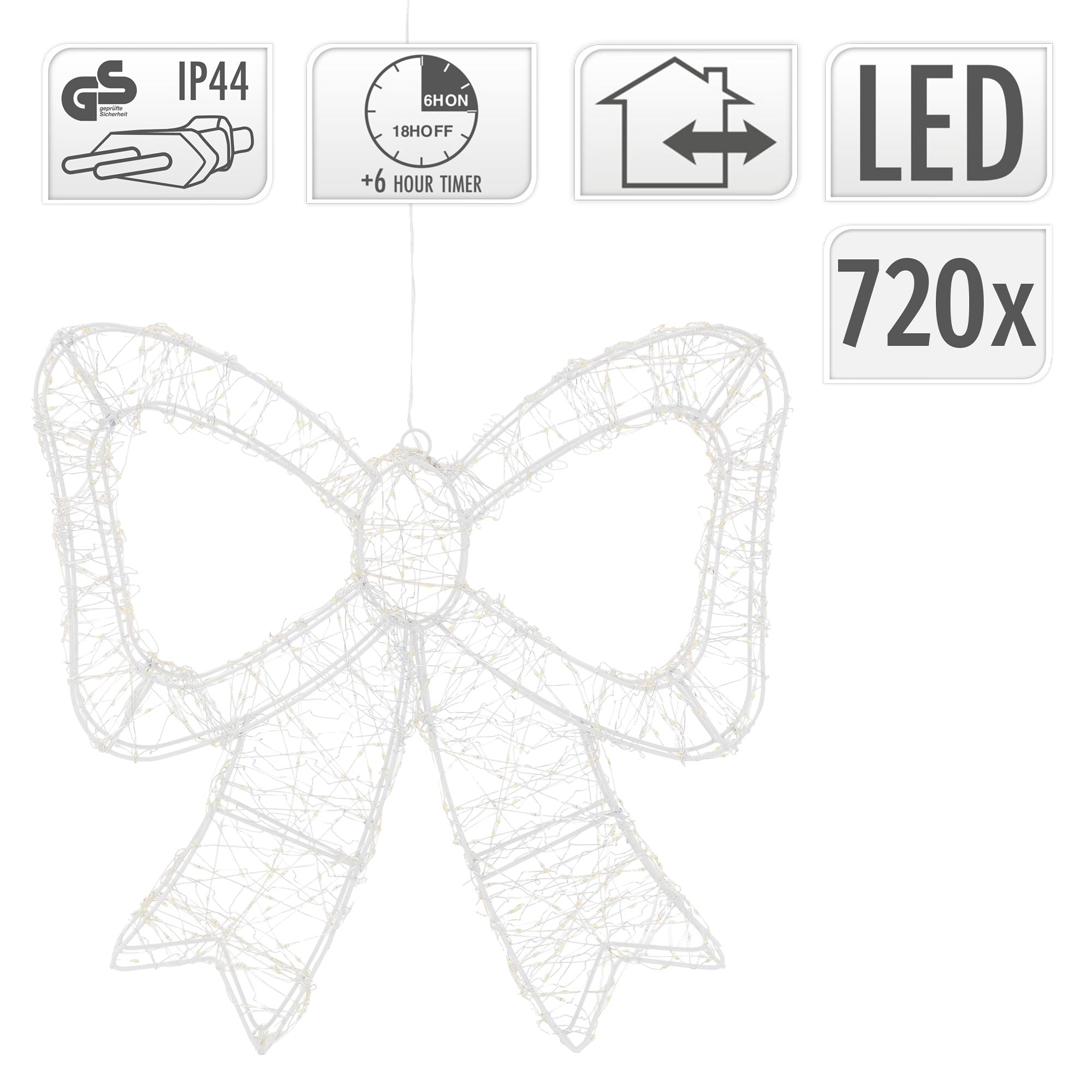 Close-up of a white illuminated decoration in the shape of a bow.