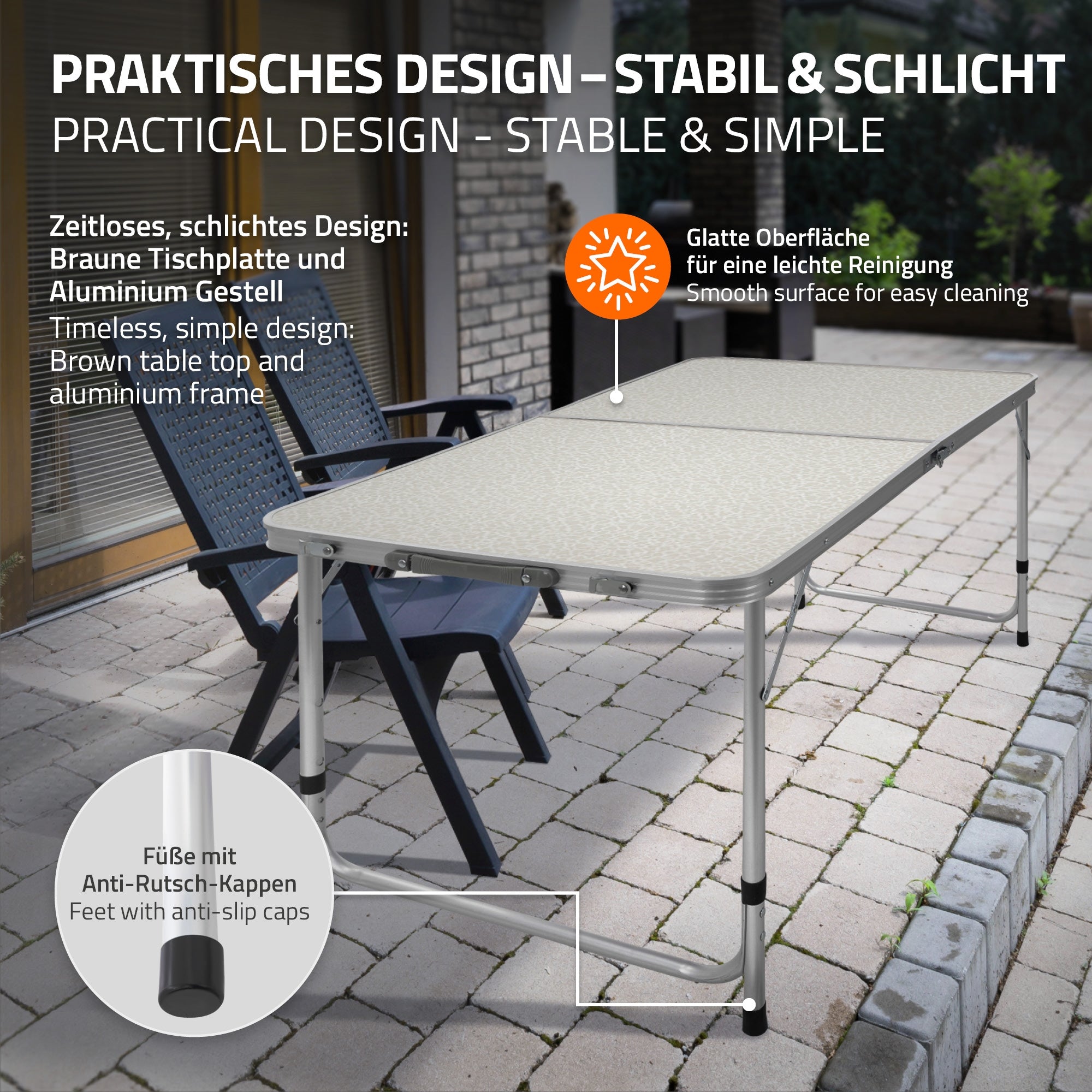 Table with a brown tabletop and aluminum frame on a paved floor.