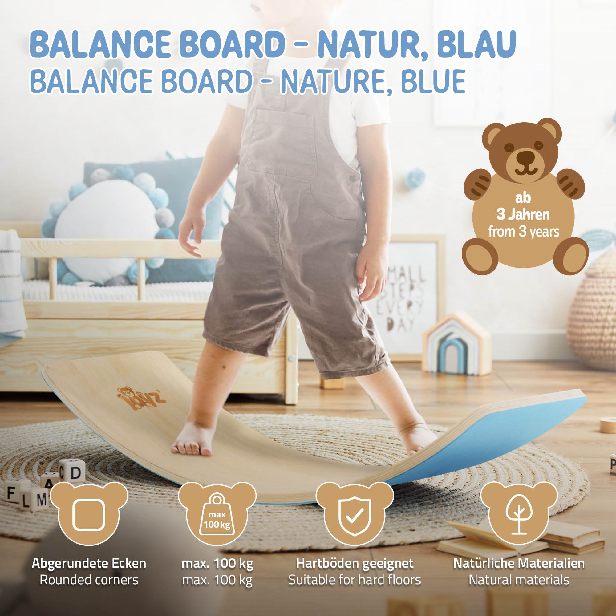Un enfant se tient sur une planche en bois qui est posée sur le sol.