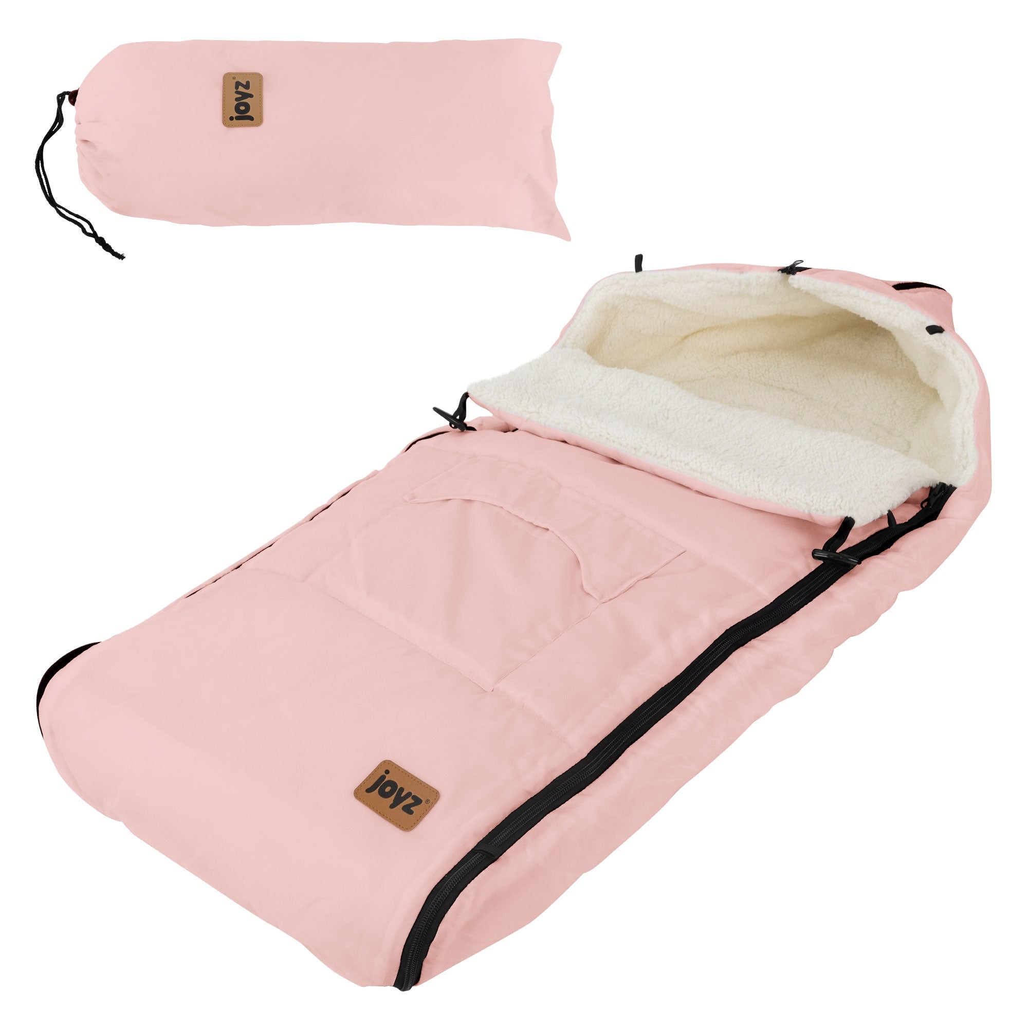 Sac de couchage rose avec capuche et fermeture éclair, doublé de matériau doux.