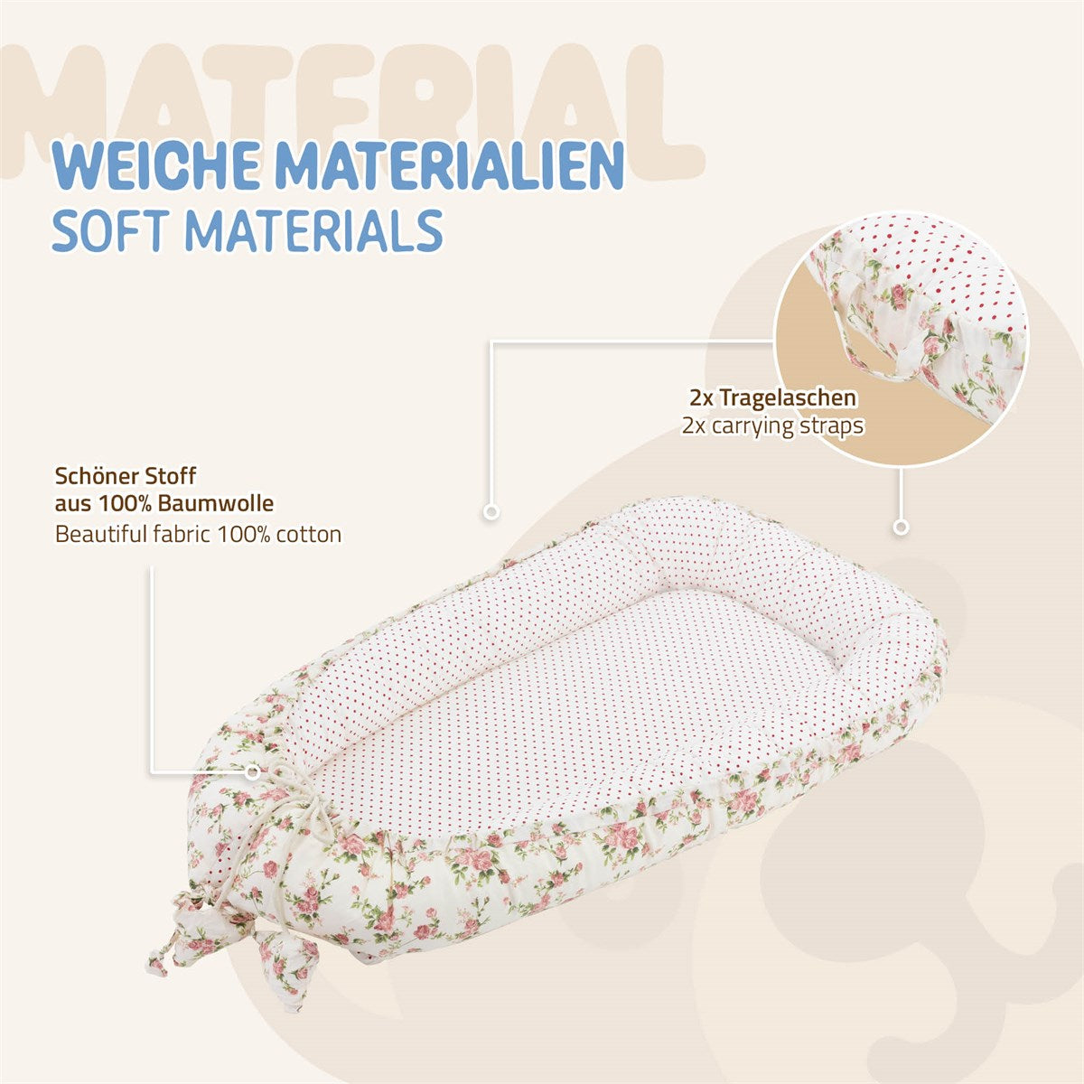 Ein Babybett aus weichem Stoff mit Tragegriffen und einem gepunkteten Innenfutter.