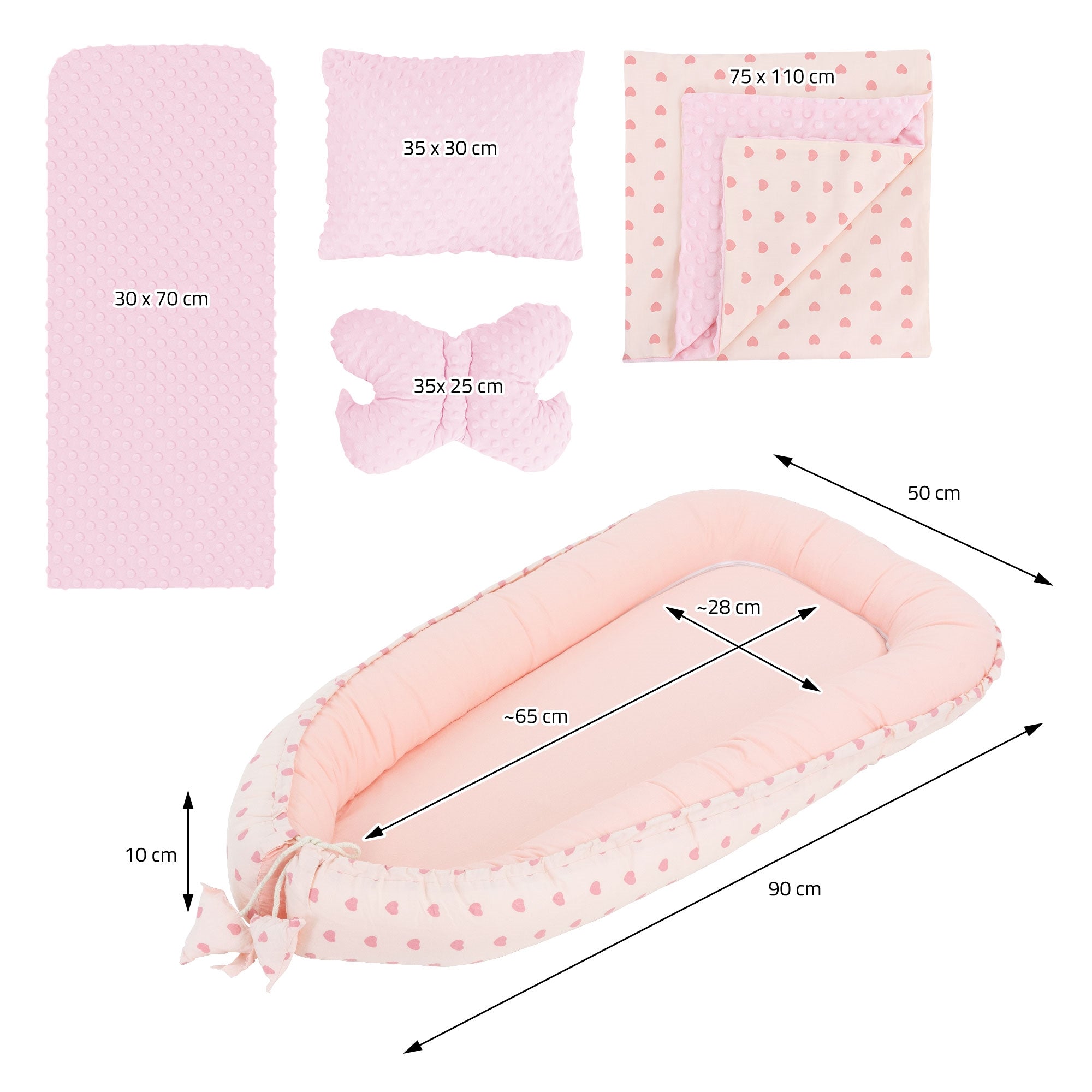 Nid avec des cœurs roses, coussin et couverture, les dimensions sont indiquées.