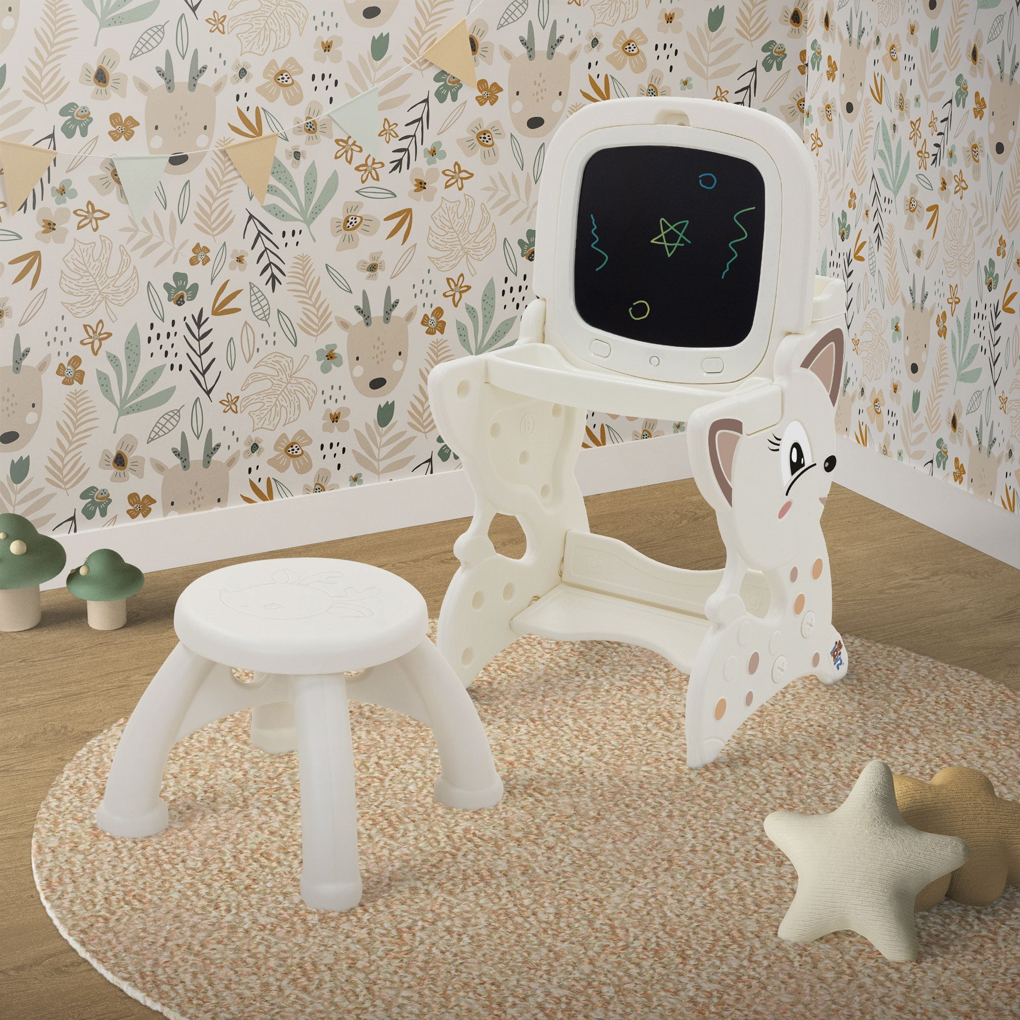 Kindermöbelset mit Tisch, Stuhl und Bildschirm in einem Raum.