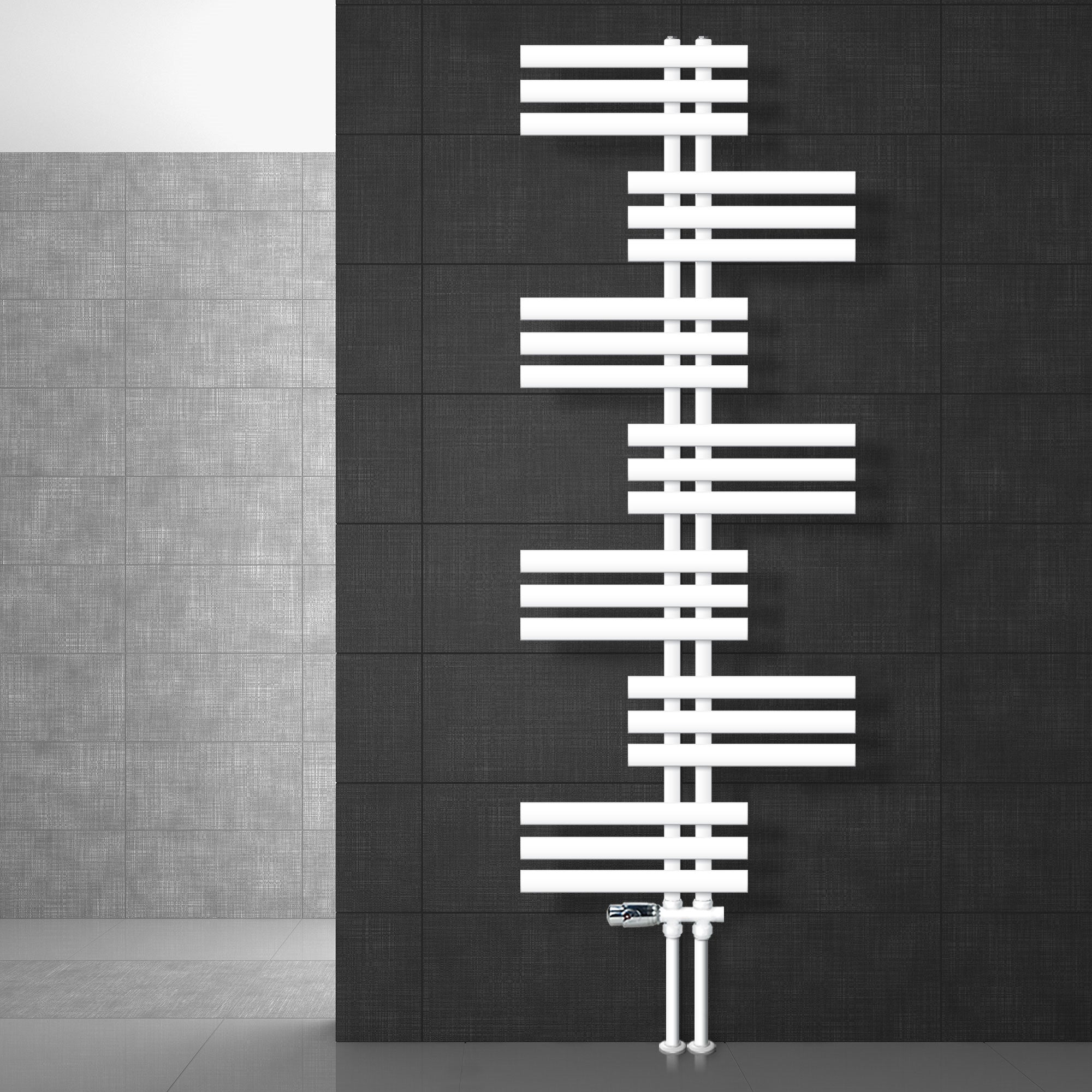 White radiator arrangement on a dark wall.