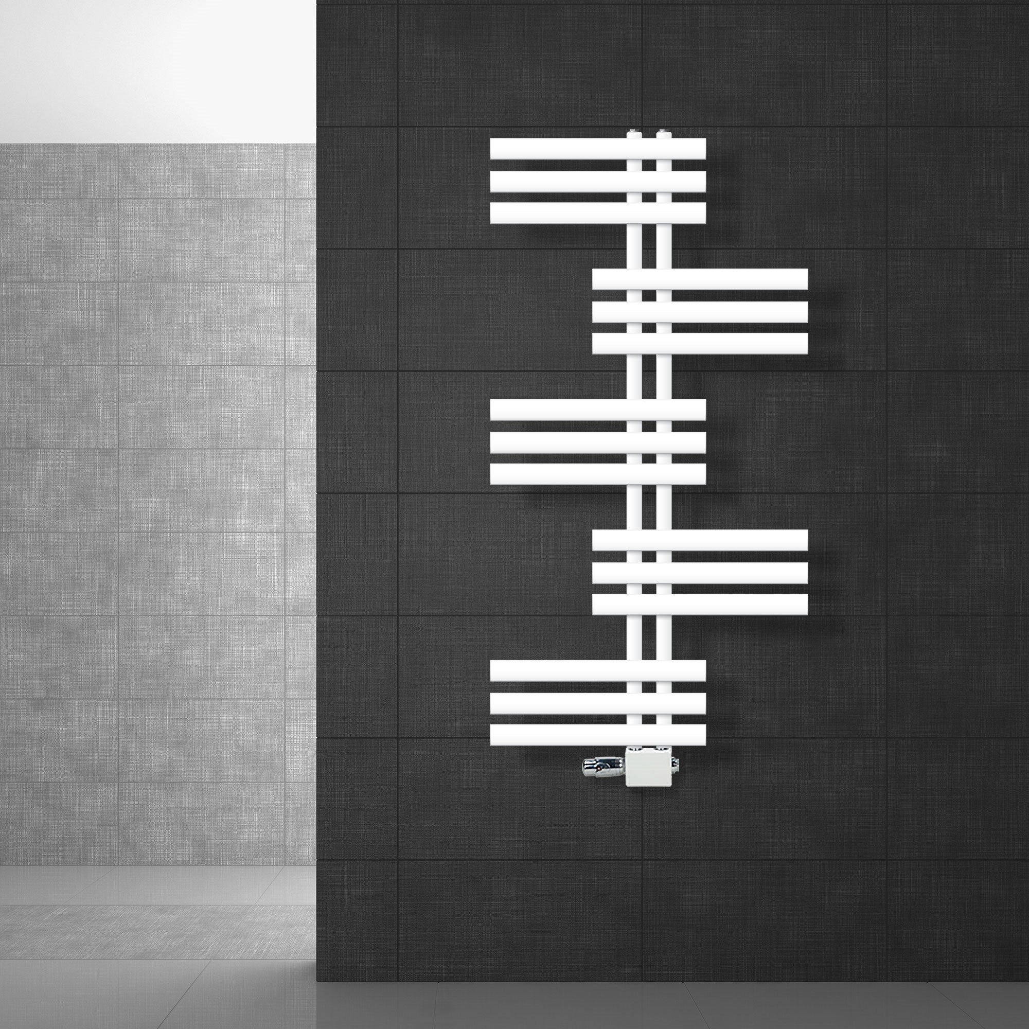 White radiator arrangement on a dark wall.