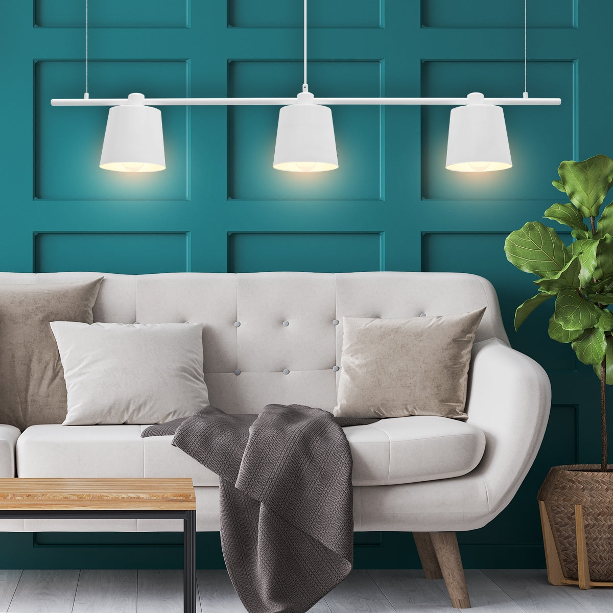Modern lamp above a light sofa in a room with a green wall.