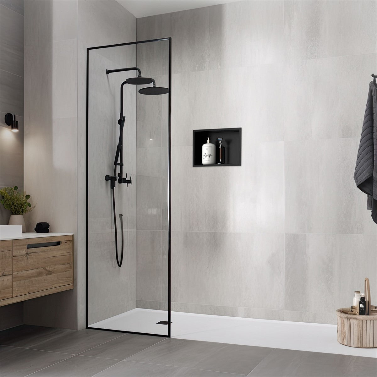 Modern shower with a black wall niche and showerhead in a bathroom.