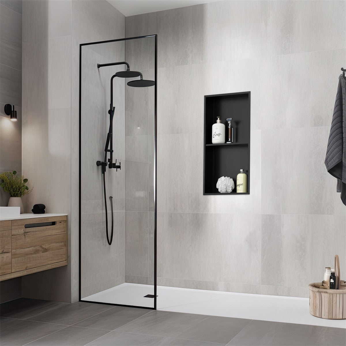 Een moderne badkamer met een douche en een zwart wandrek.