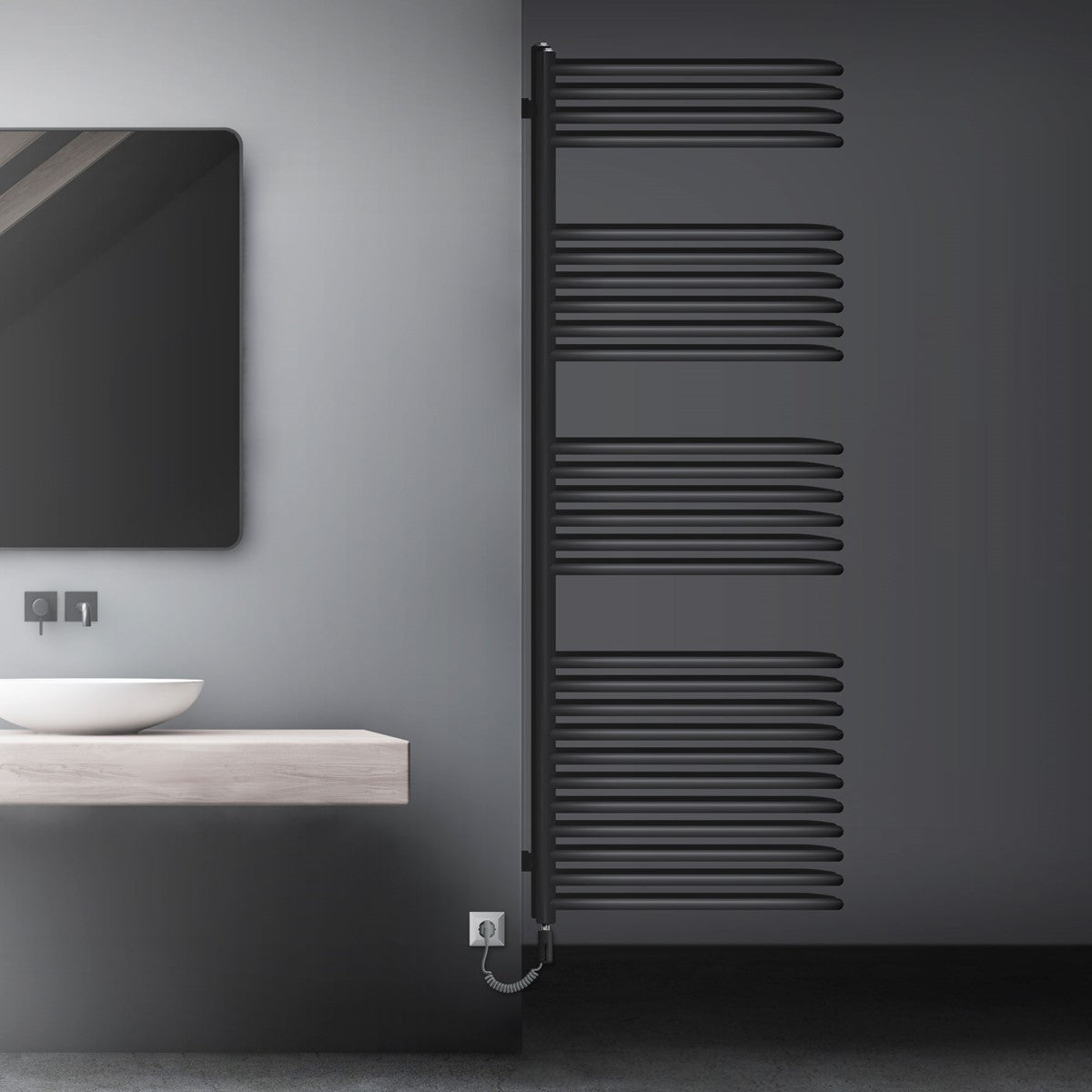 Radiador de color antracita en una pared junto a un lavabo.