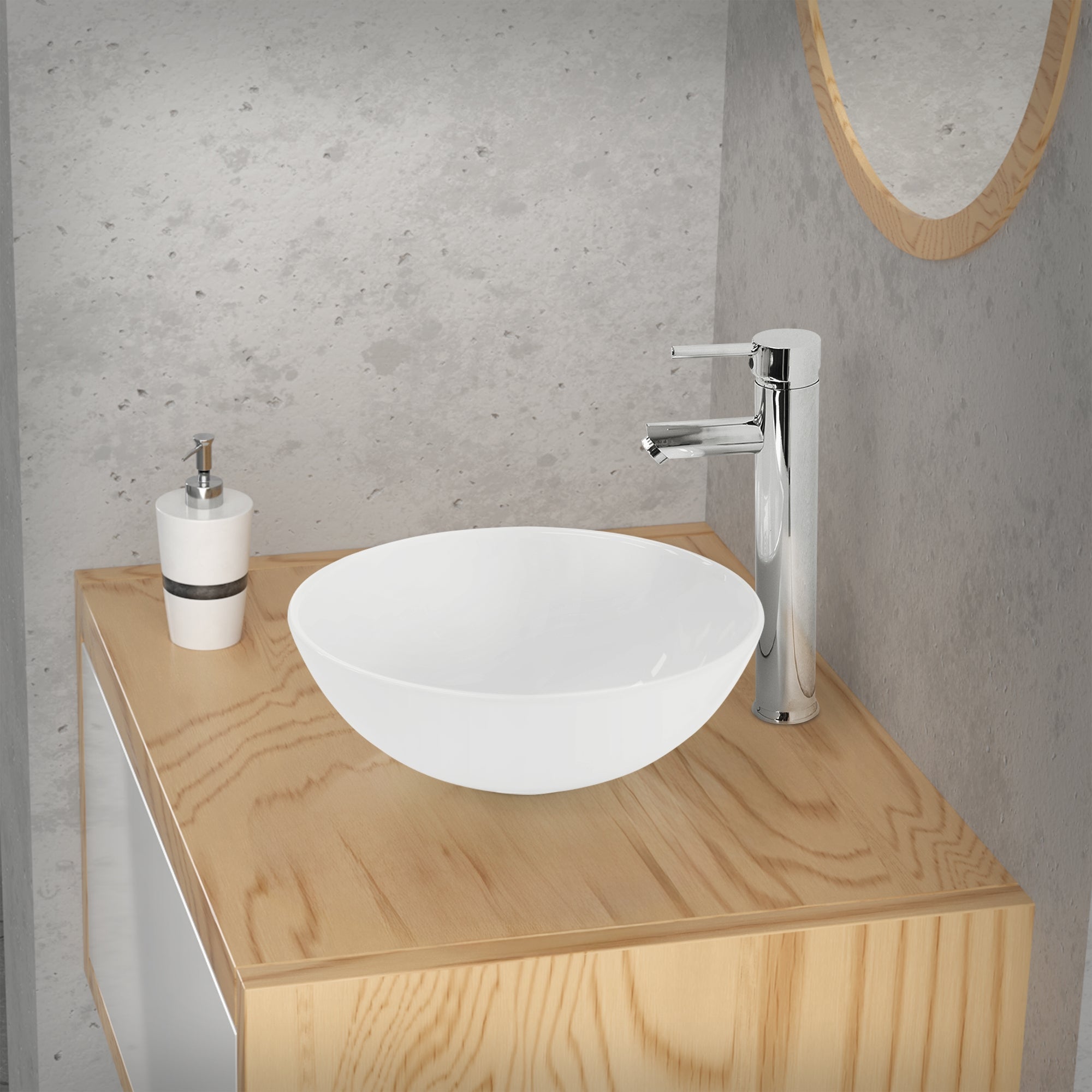Round sink on a wooden cabinet with faucet and soap dispenser.