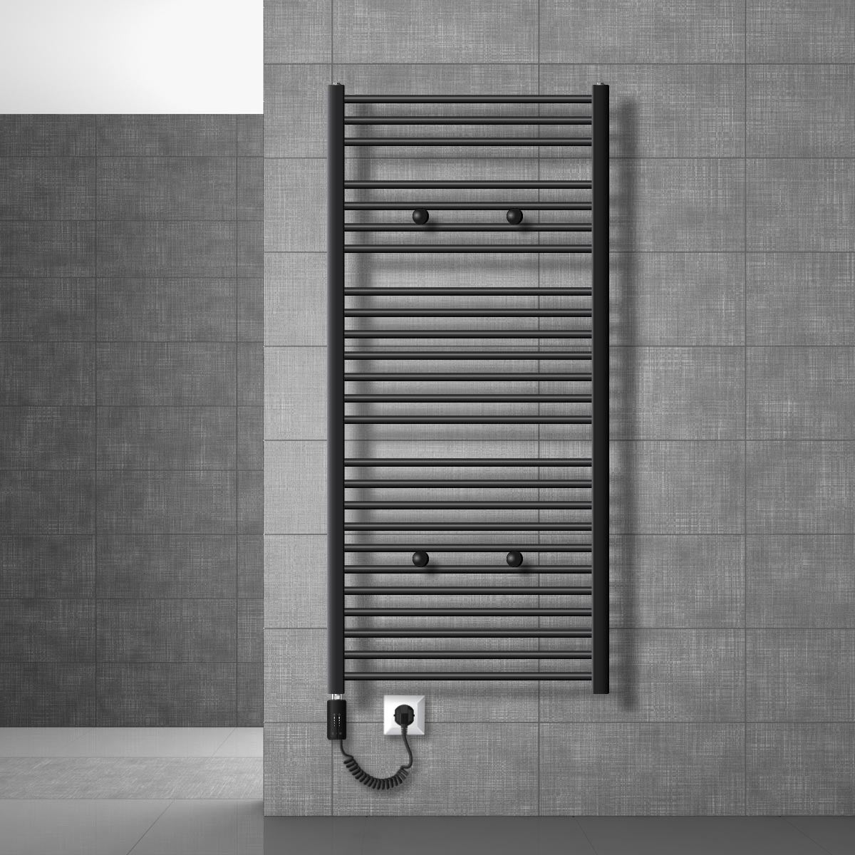 Radiateur sèche-serviettes noir monté sur un mur gris.