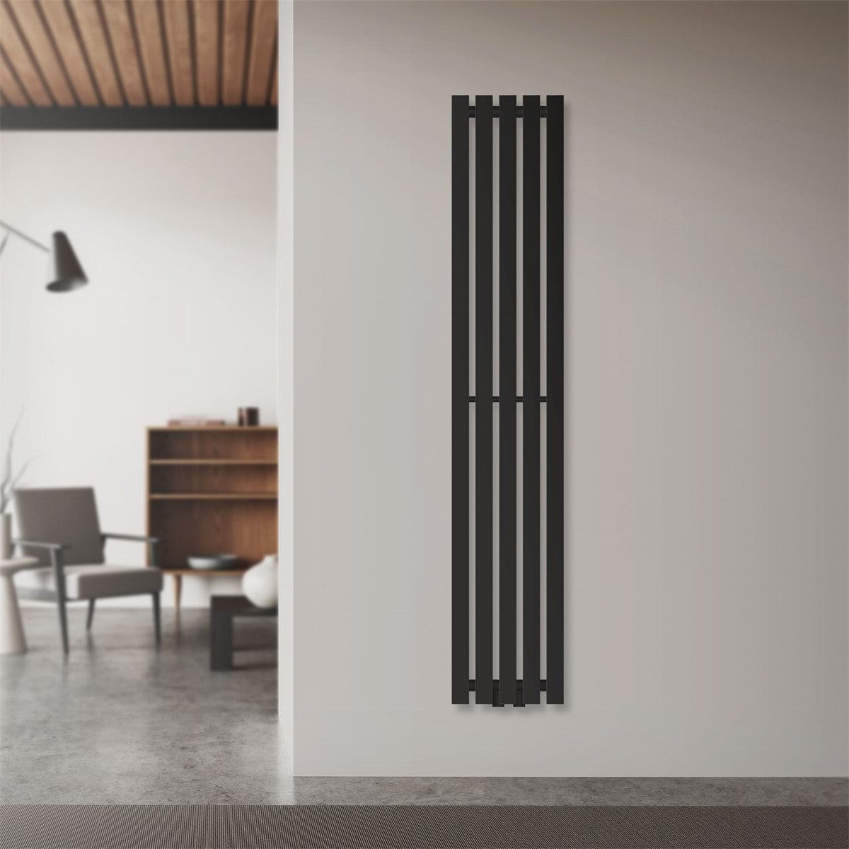 Tall, slim black radiator on a wall.