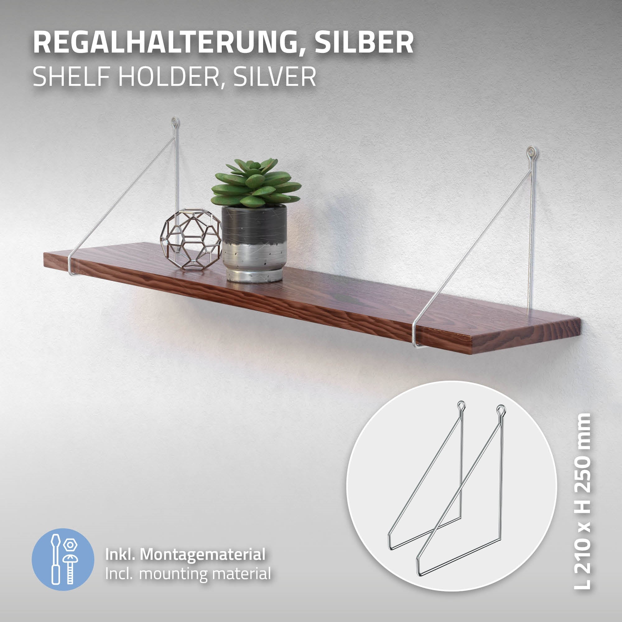 Sølv hyldebeslag med en plante og en dekoration på en hylde.