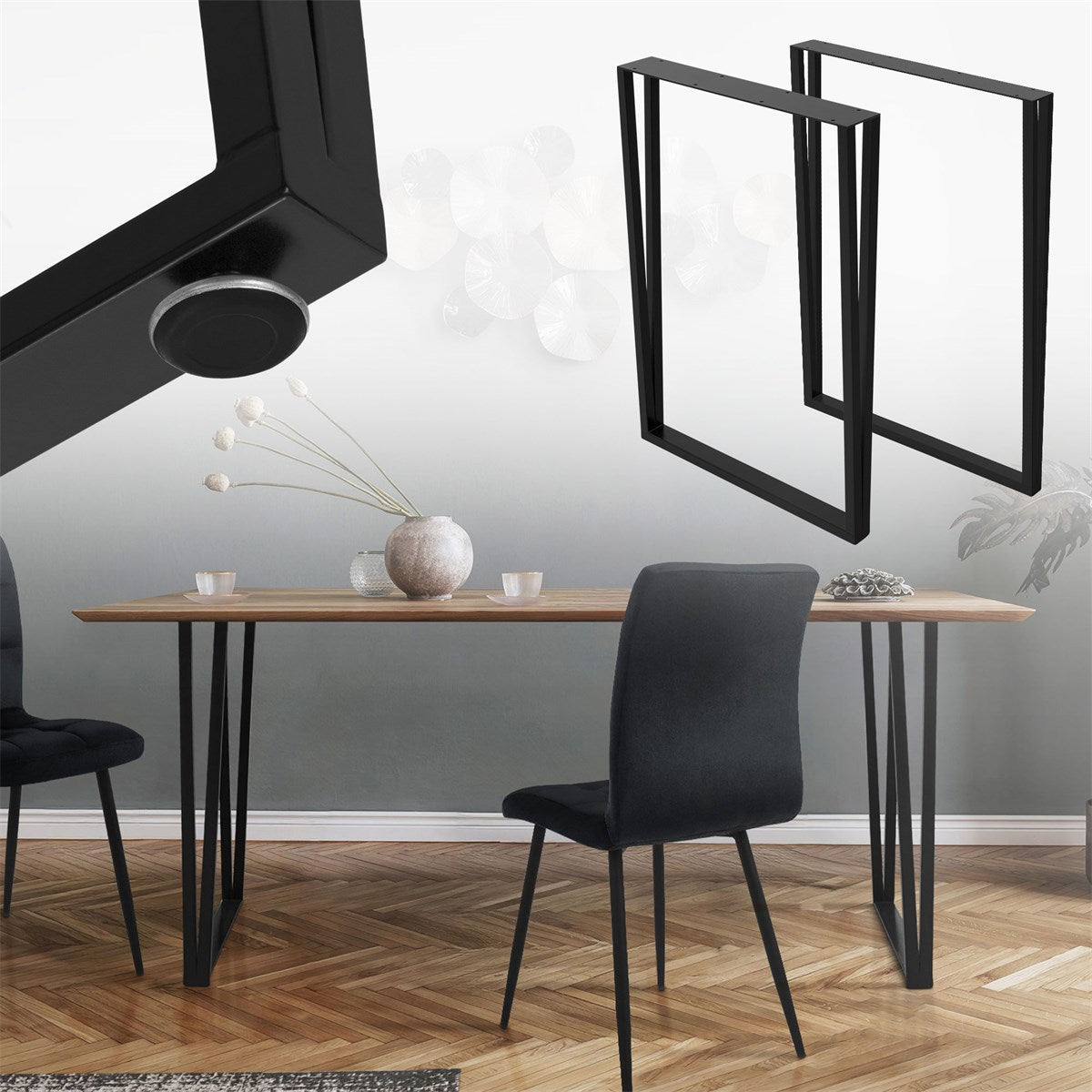 A table with chairs, with a wall featuring decorative elements in the background.