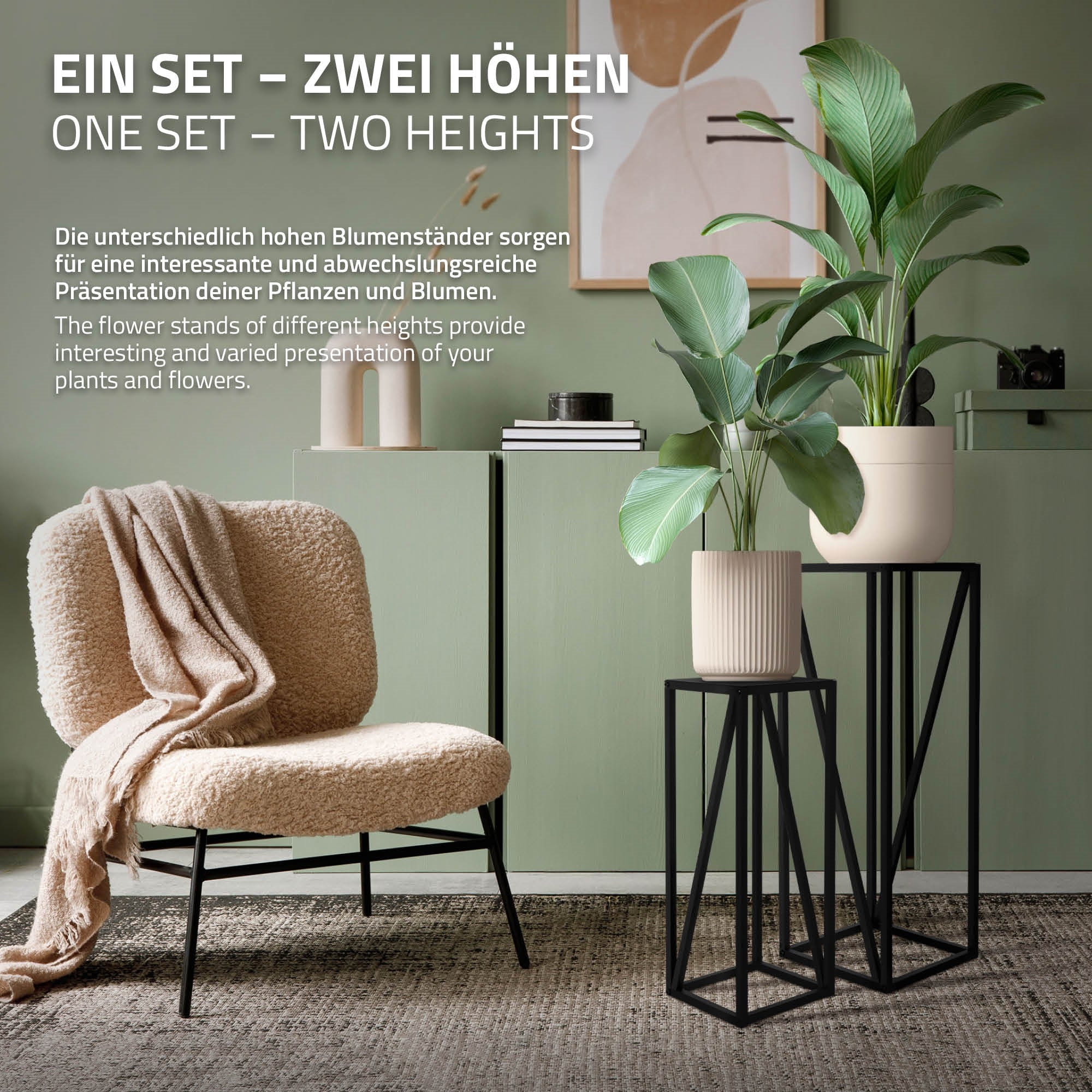 A chair next to two plant stands with plants in a room with a green wall.