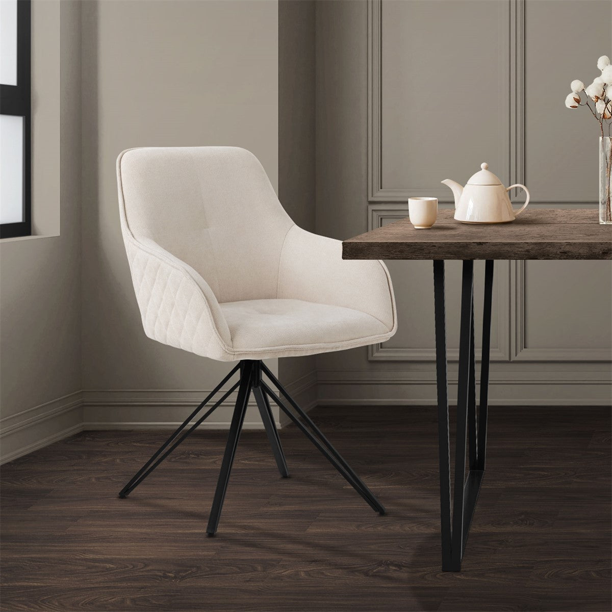 Chair at a table in a room with wooden flooring.