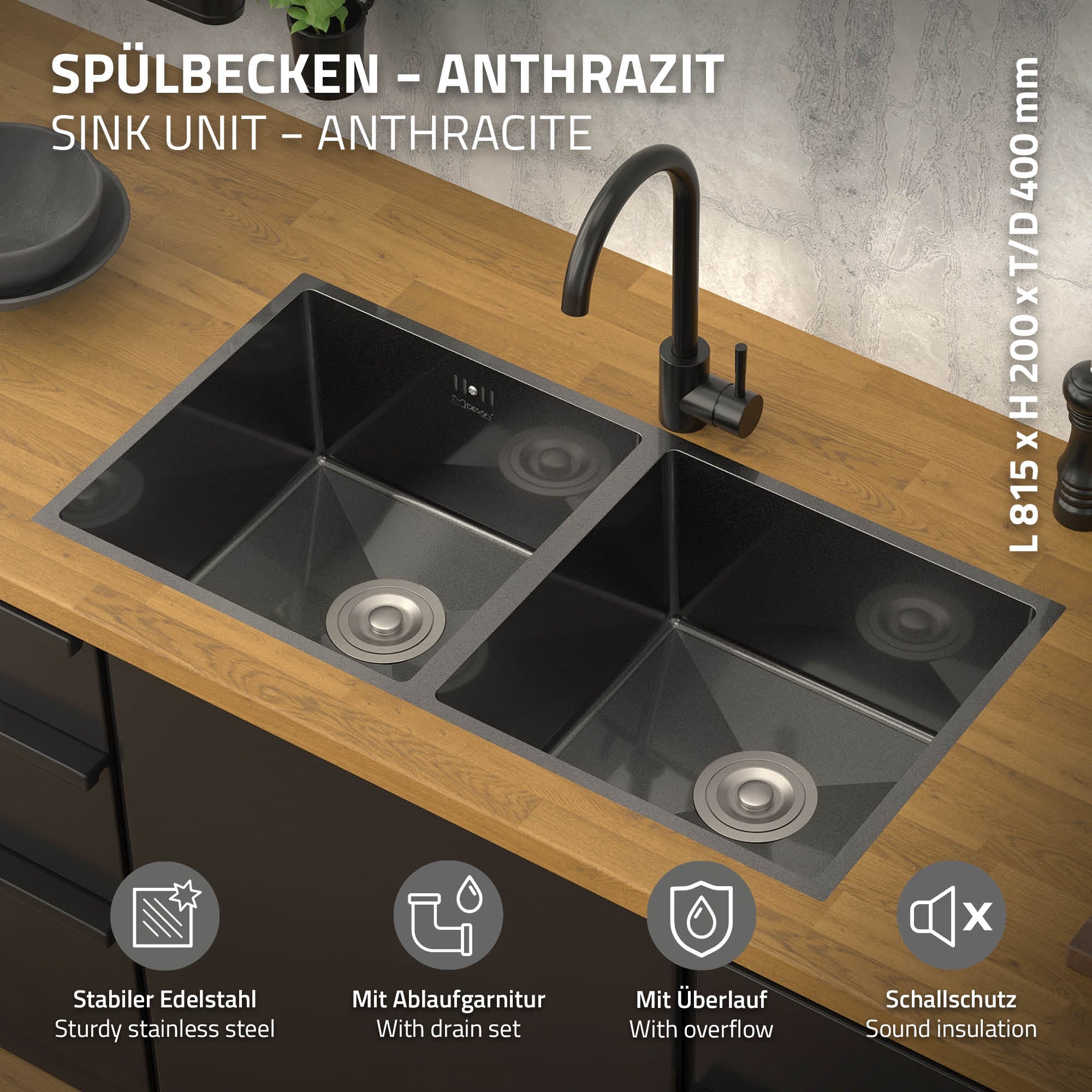 Anthrazitfarbene Spüle mit zwei Becken und Wasserhahn auf Holzarbeitsp