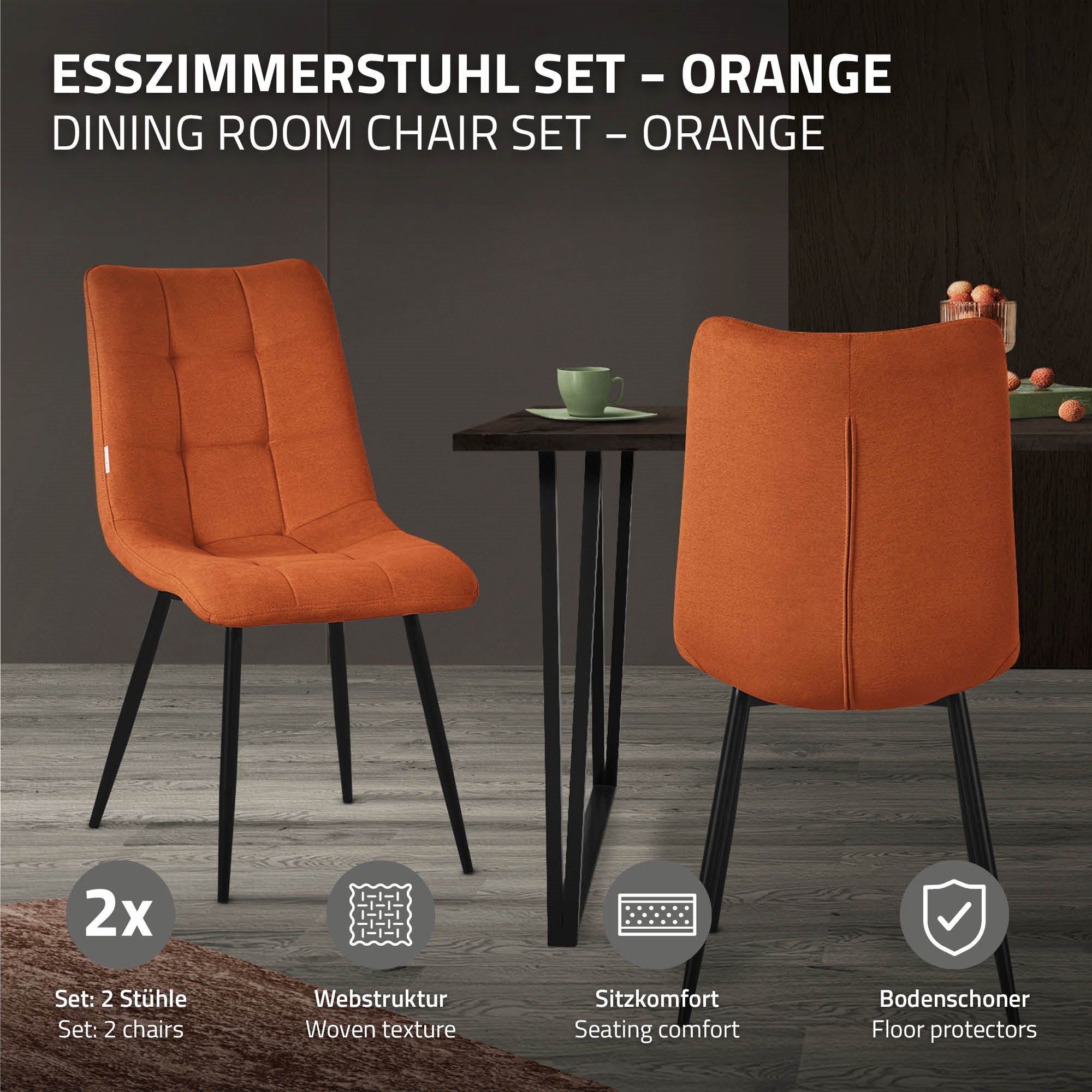 Zwei orangefarbene Stühle und ein Tisch in einem modernen Raum.