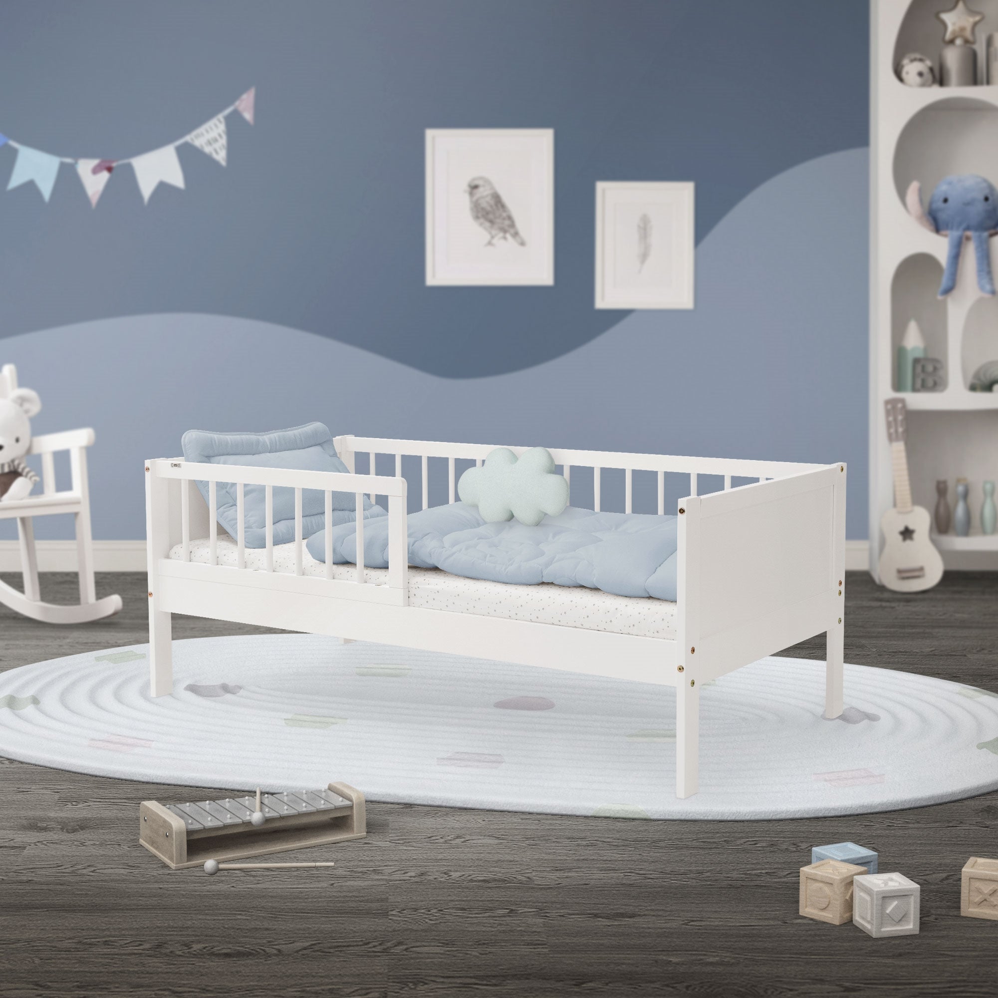 Wooden children's bed with mattress and fall protection in a room.