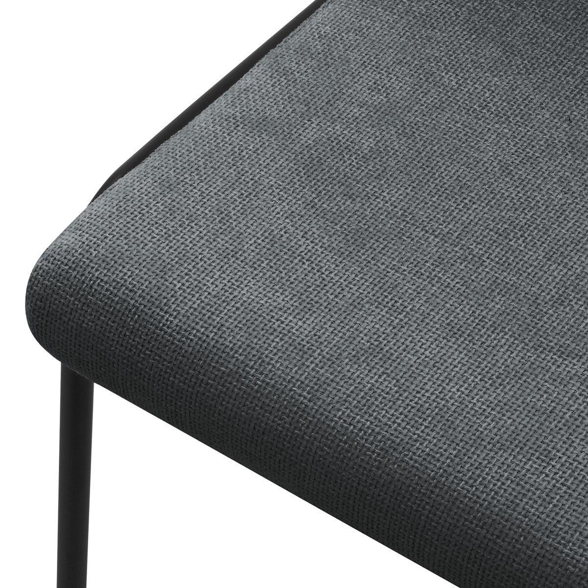 Close-up of the seat of a gray bar stool.