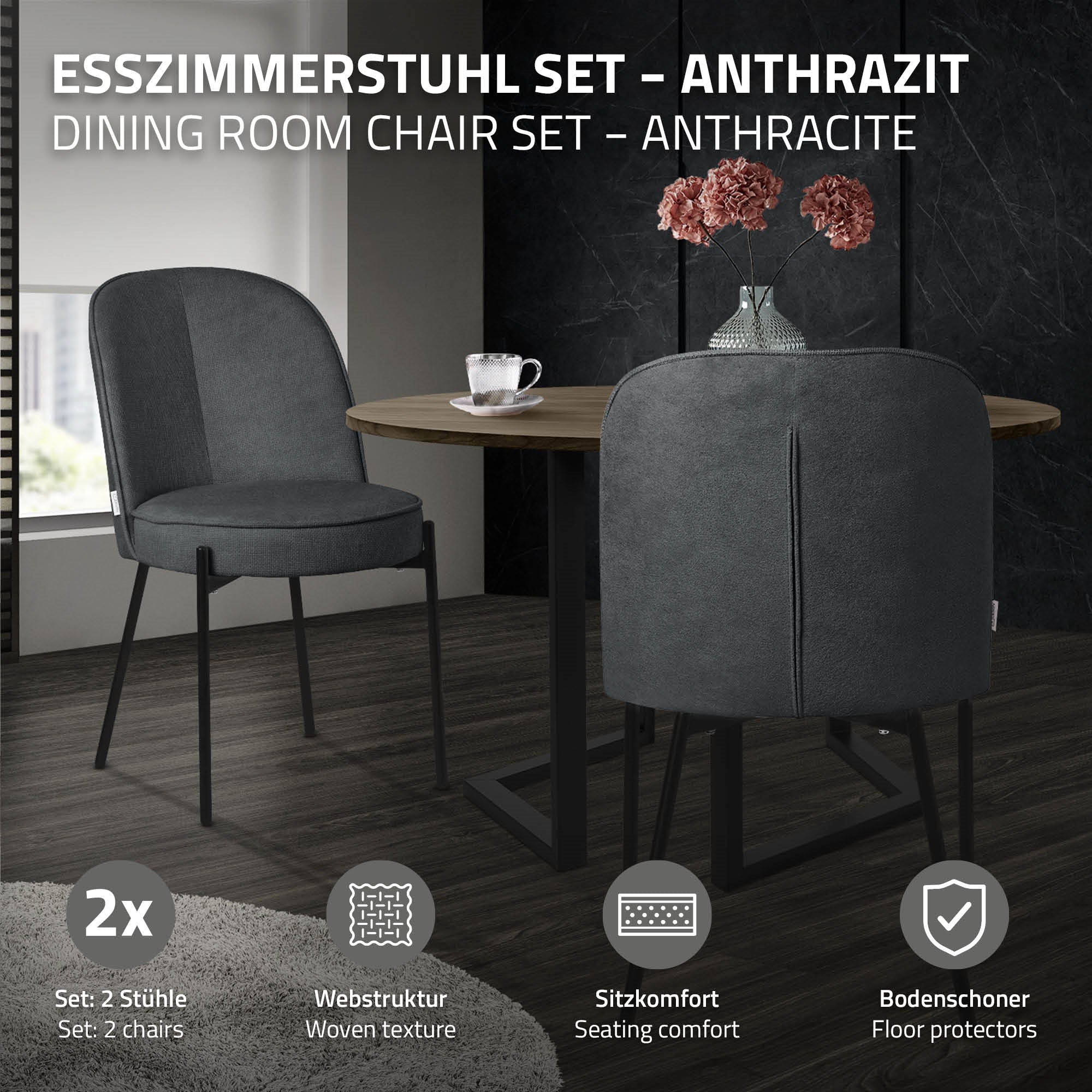 Esszimmerstuhl-Set in Anthrazit, zwei Stühle, auf einem Holztisch.
