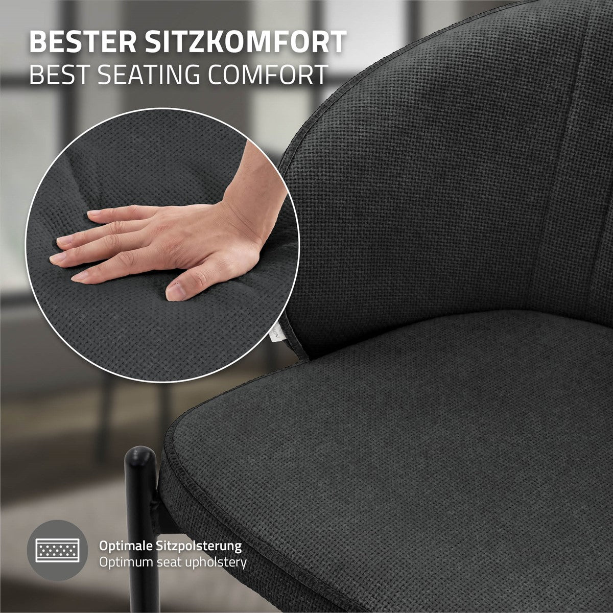 Close-up of a hand pressing on an upholstered chair.