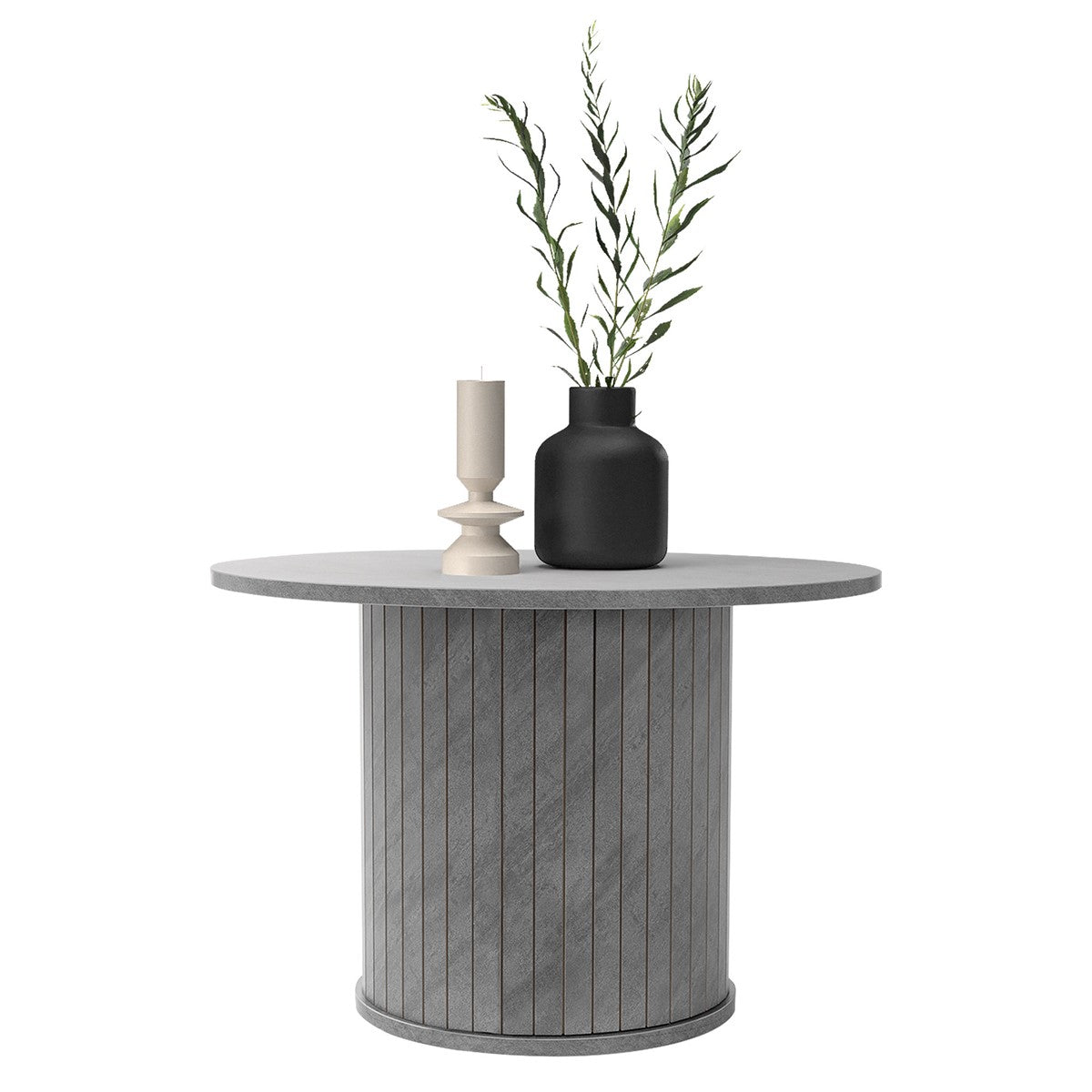 Round table made of grey material with a vase and a candle.