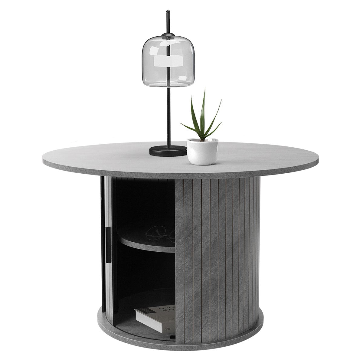 Runder Tisch mit grauer Oberfläche, schwarzer Lampe und Pflanze in einem Topf.
