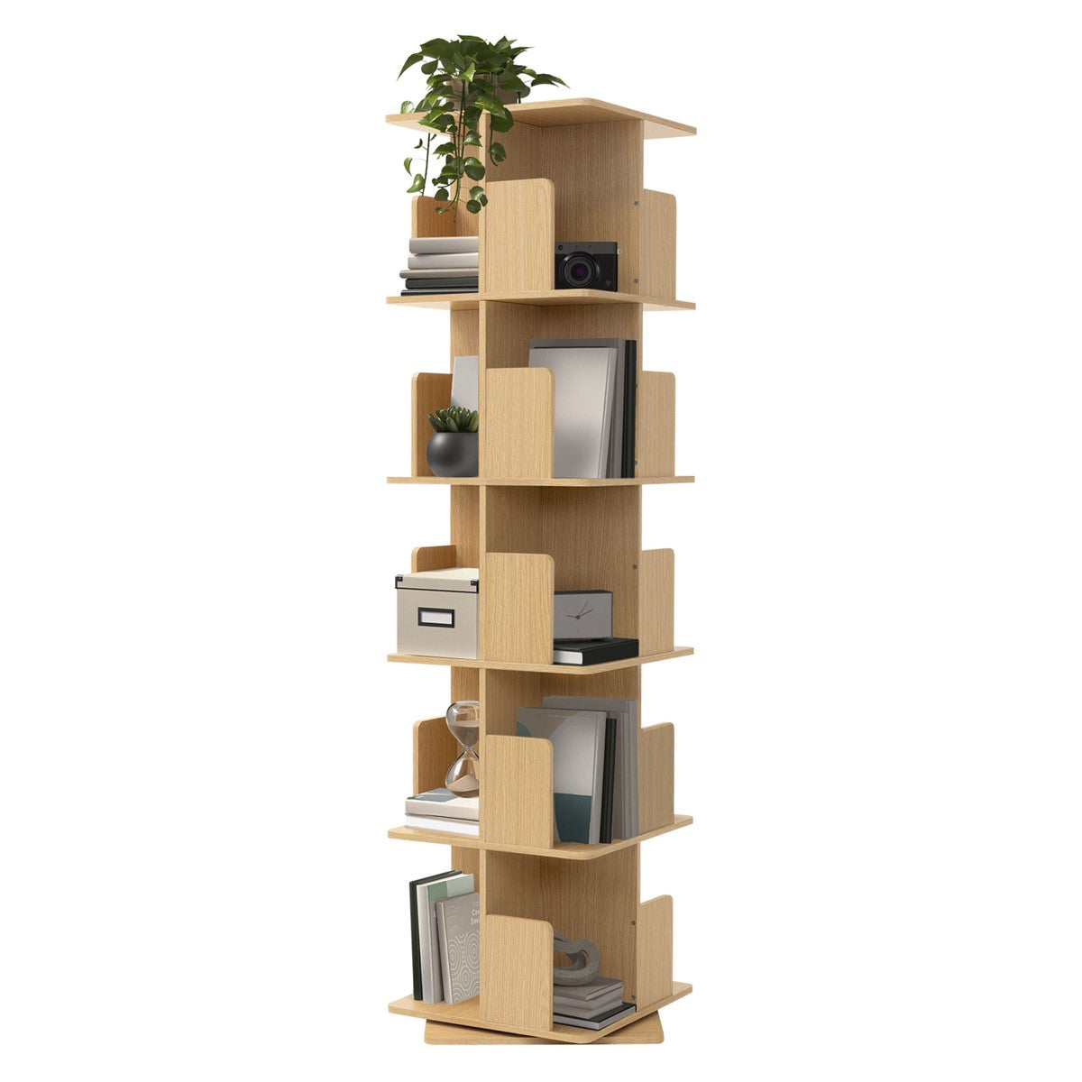 A rotating wooden bookcase with five tiers and a plant.